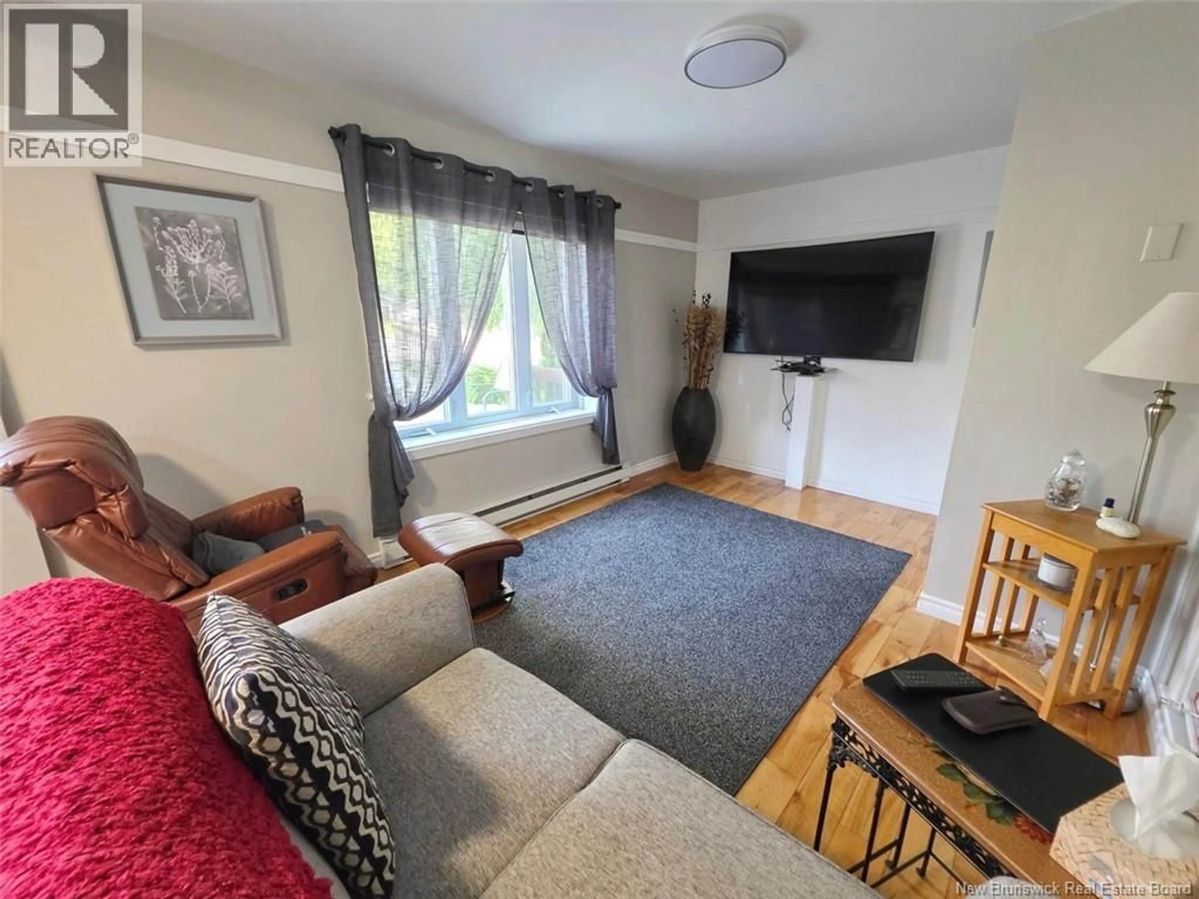 Living room with furniture, unknown for 35 ORDONNANCE AVENUE, Edmundston New Brunswick E3V1C3