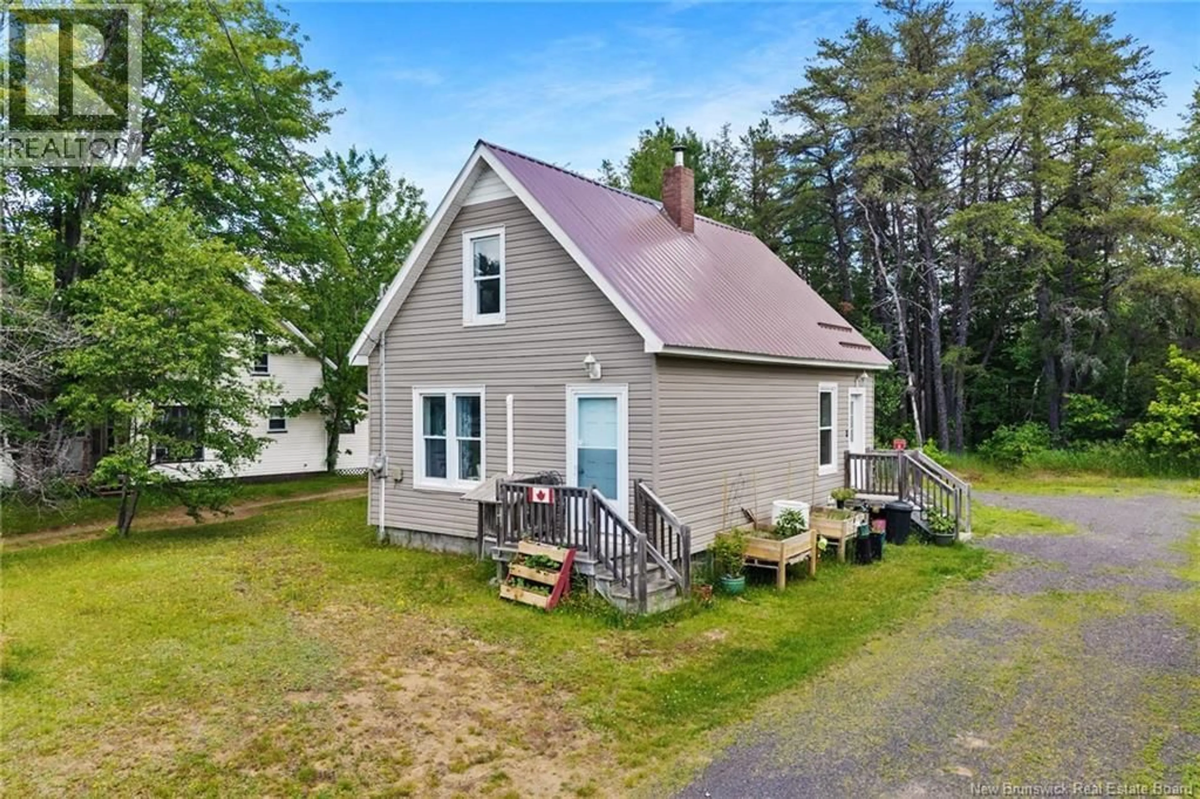 A pic from outside/outdoor area/front of a property/back of a property/a pic from drone, street for 72 MCLEOD AVE, Chipman New Brunswick E4A2B8
