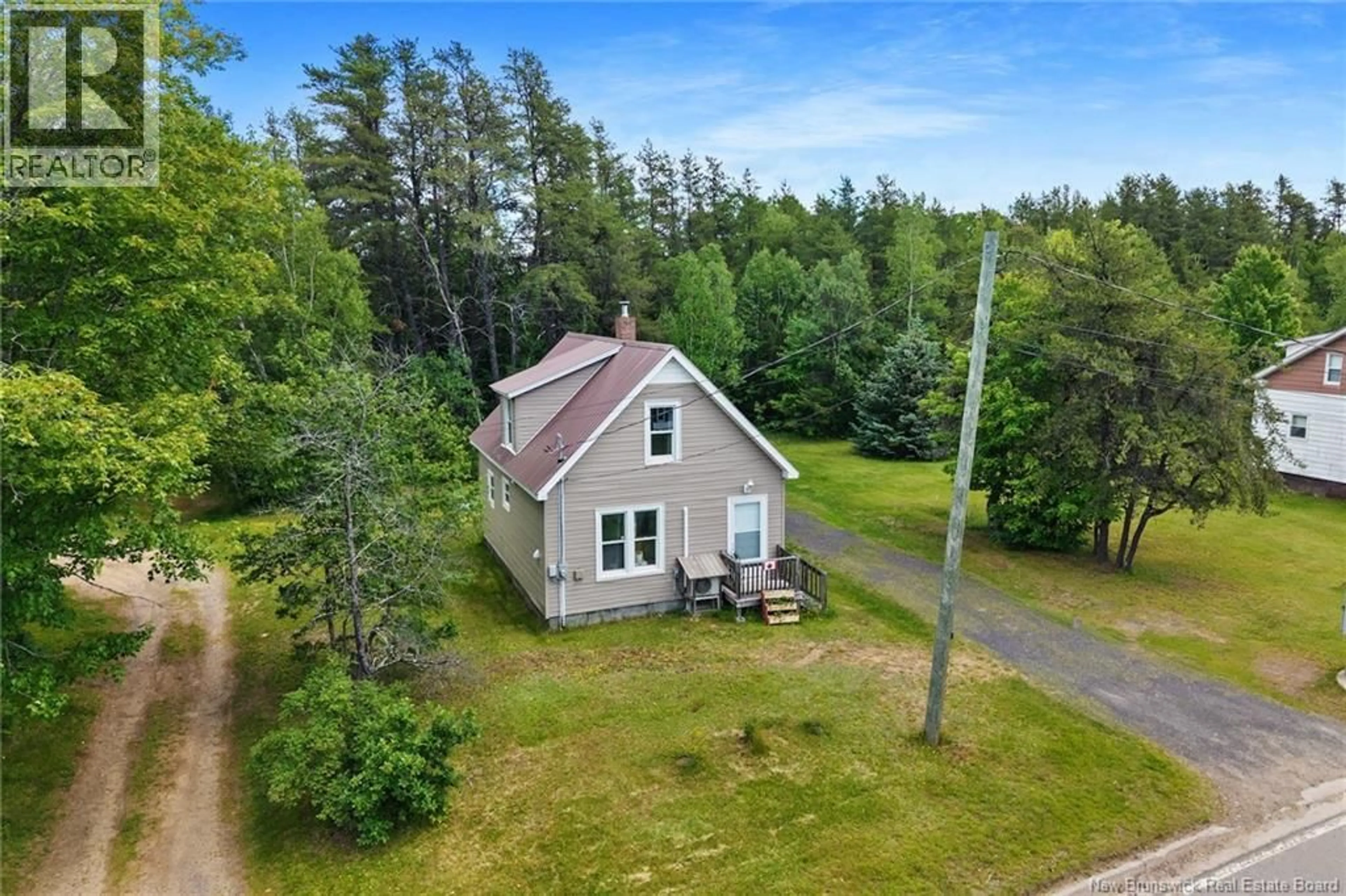 A pic from outside/outdoor area/front of a property/back of a property/a pic from drone, unknown for 72 MCLEOD AVE, Chipman New Brunswick E4A2B8