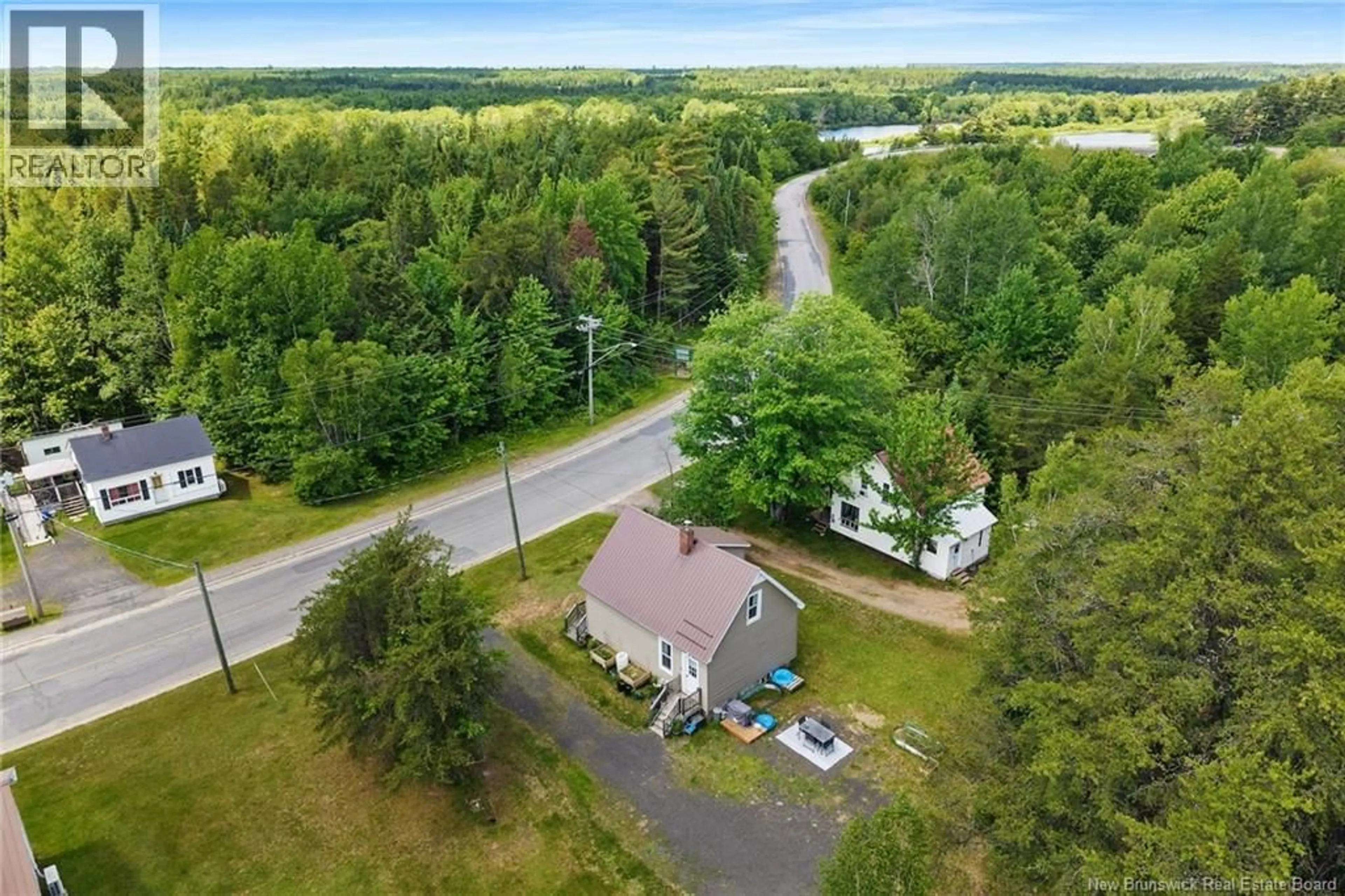 A pic from outside/outdoor area/front of a property/back of a property/a pic from drone, unknown for 72 MCLEOD AVE, Chipman New Brunswick E4A2B8