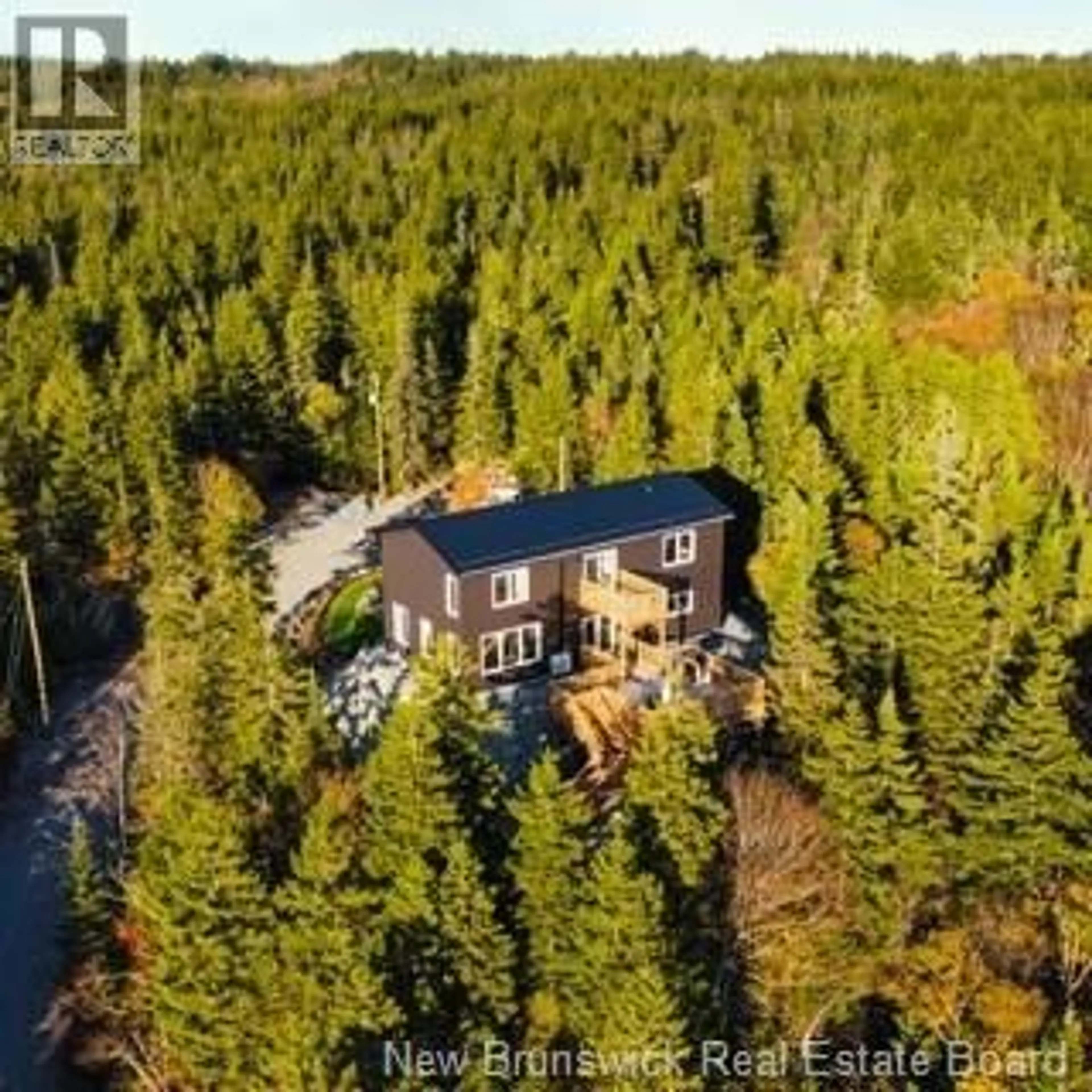 A pic from outside/outdoor area/front of a property/back of a property/a pic from drone, forest/trees view for 2315 RED HEAD ROAD, Saint John New Brunswick E2P1J5