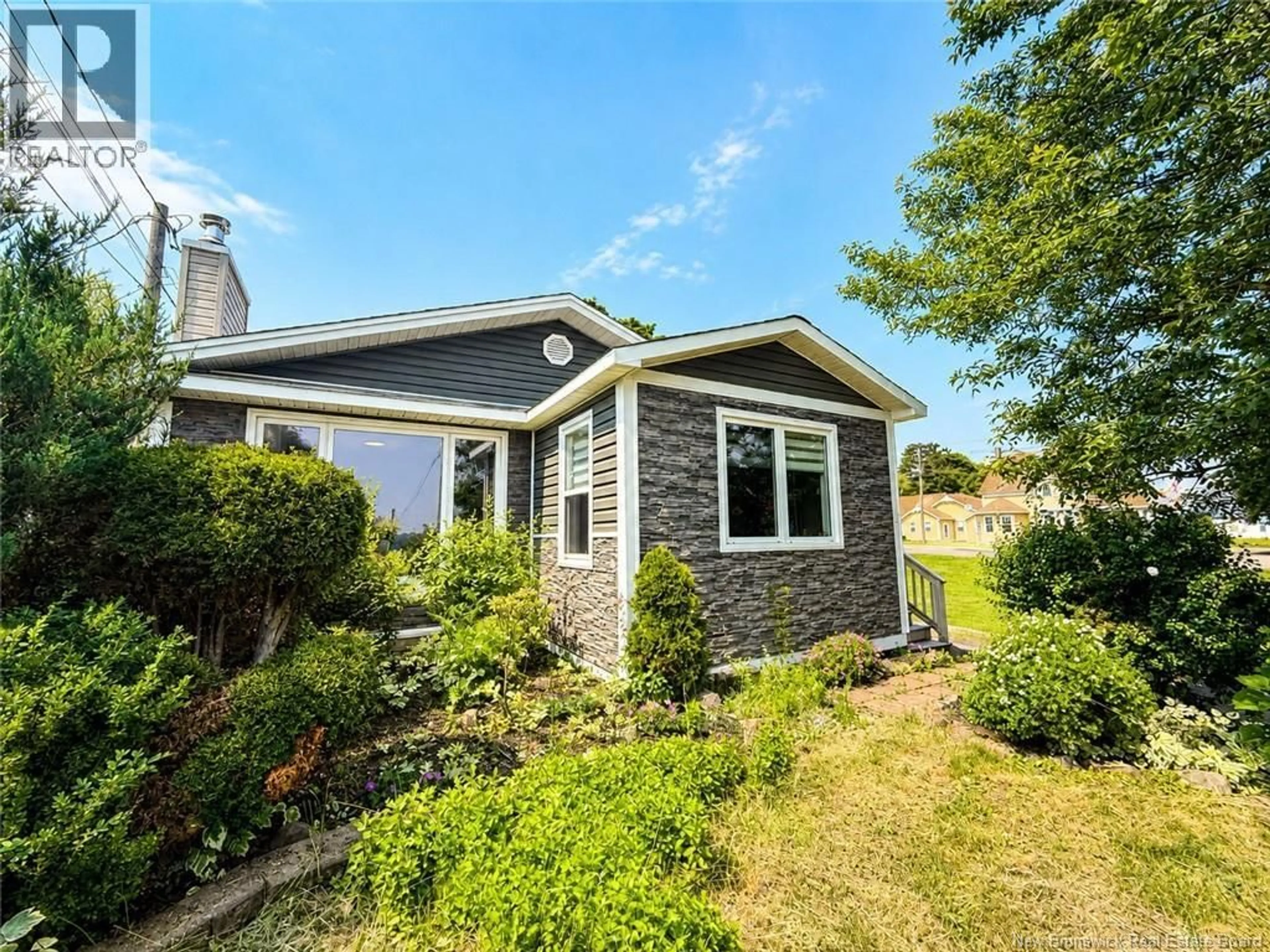 Home with vinyl exterior material, street for 101 IRVING BOULEVARD, Bouctouche New Brunswick E4S3J9