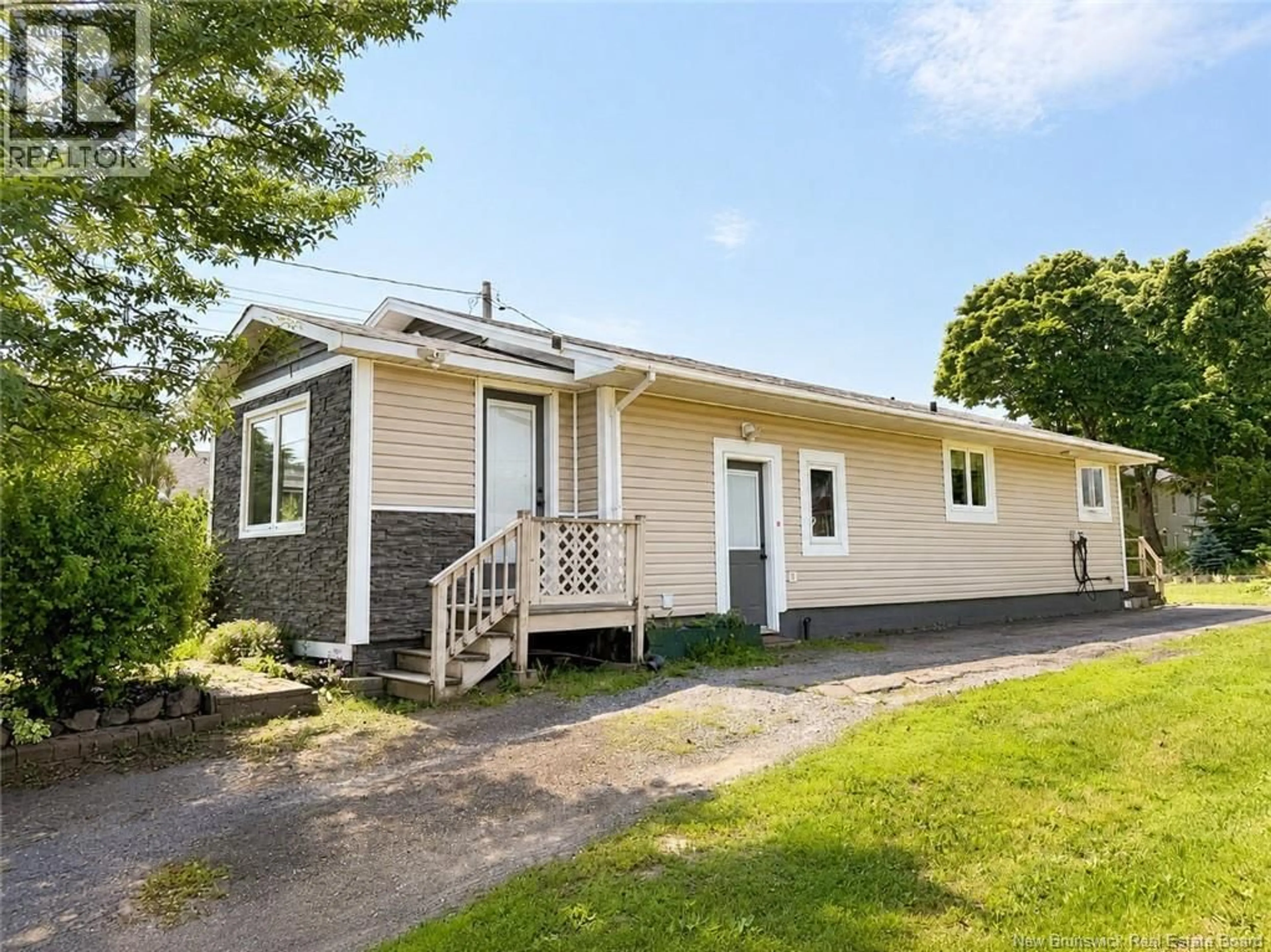 Home with vinyl exterior material, street for 101 IRVING BOULEVARD, Bouctouche New Brunswick E4S3J9