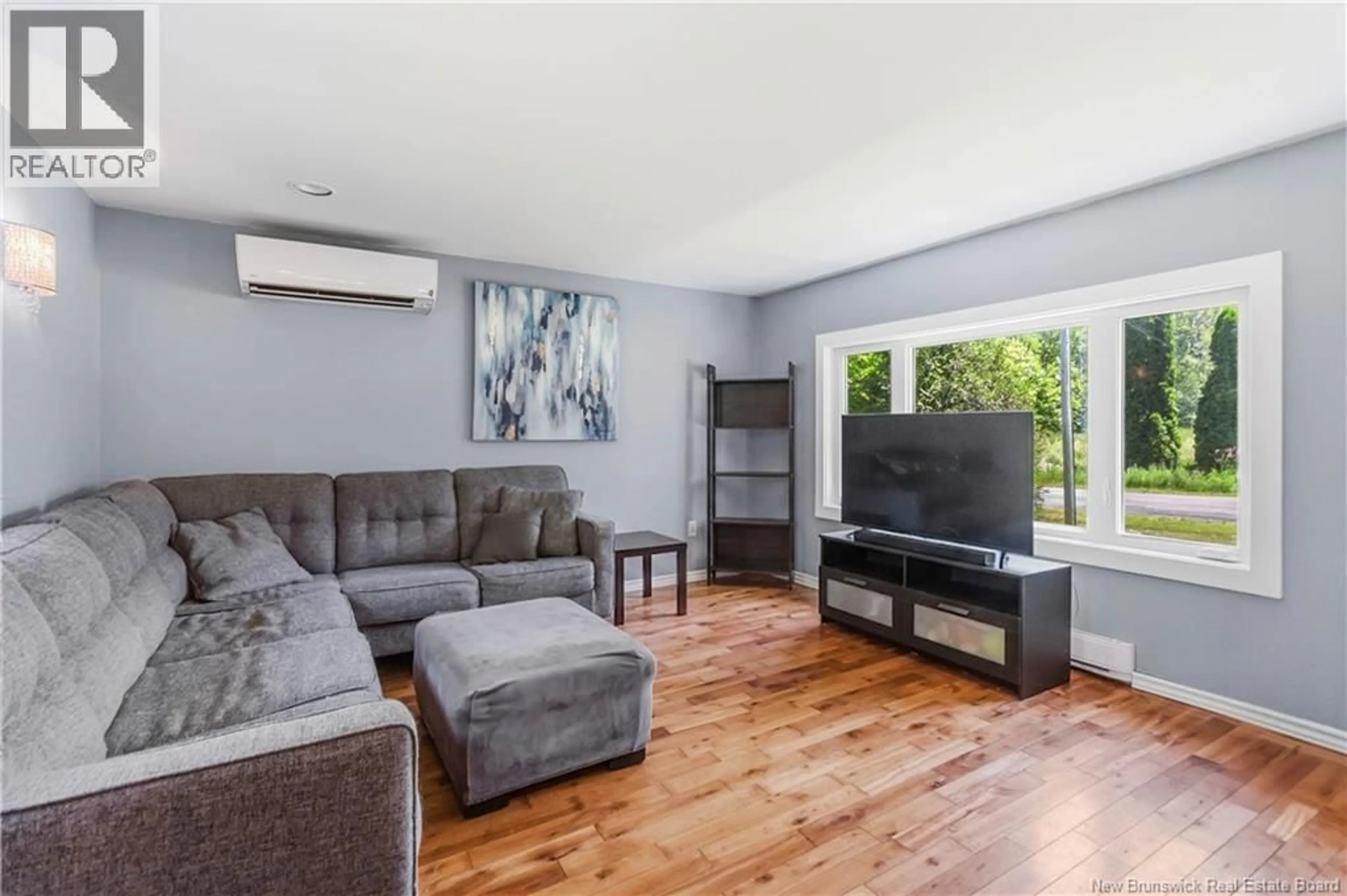 Living room with furniture, wood/laminate floor for 38 KIERSTEAD STREET, Lower Coverdale New Brunswick E1J1G7