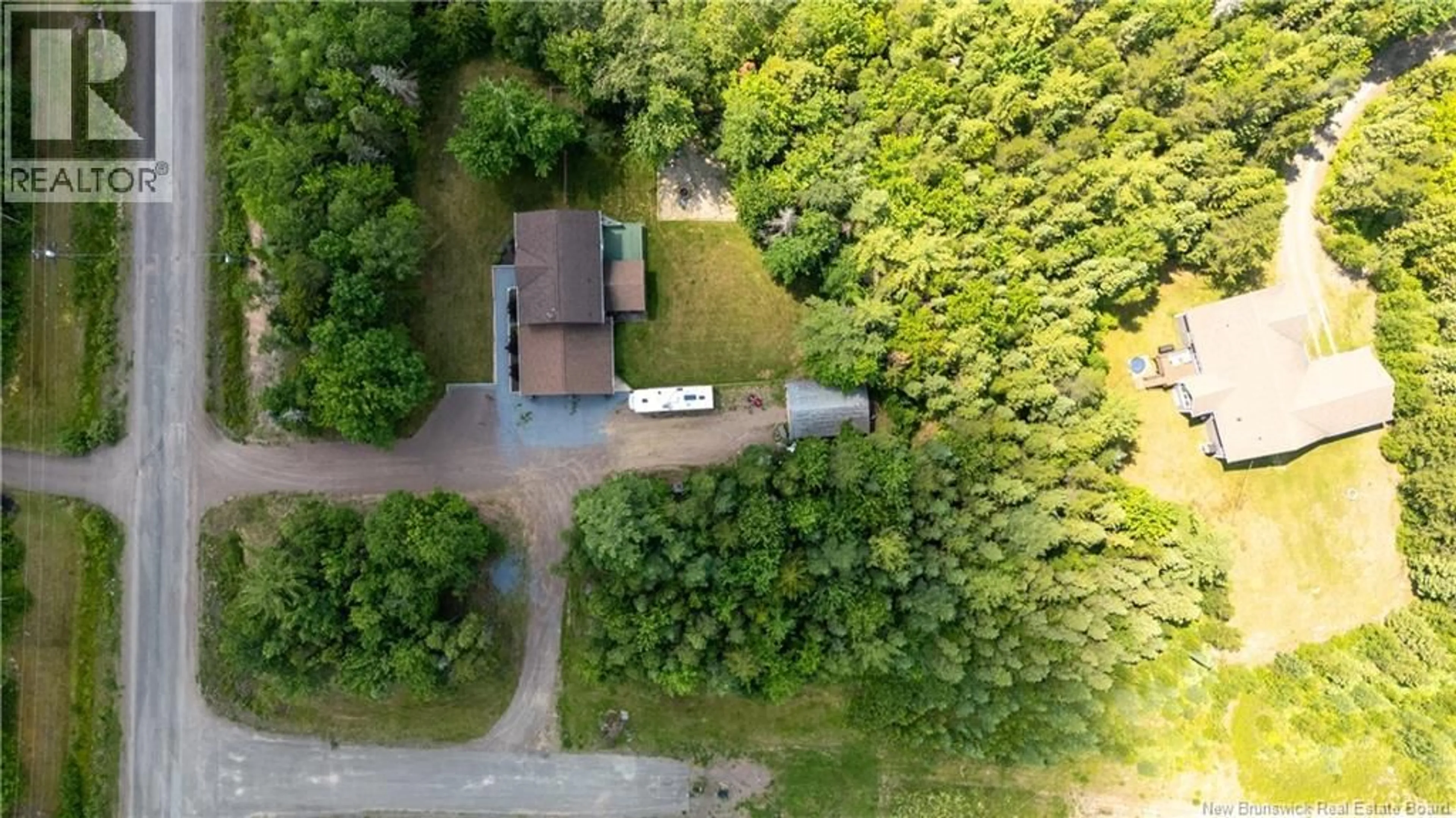 A pic from outside/outdoor area/front of a property/back of a property/a pic from drone, forest/trees view for 32 BELLEFIELD, Lower Coverdale New Brunswick E1J0A9