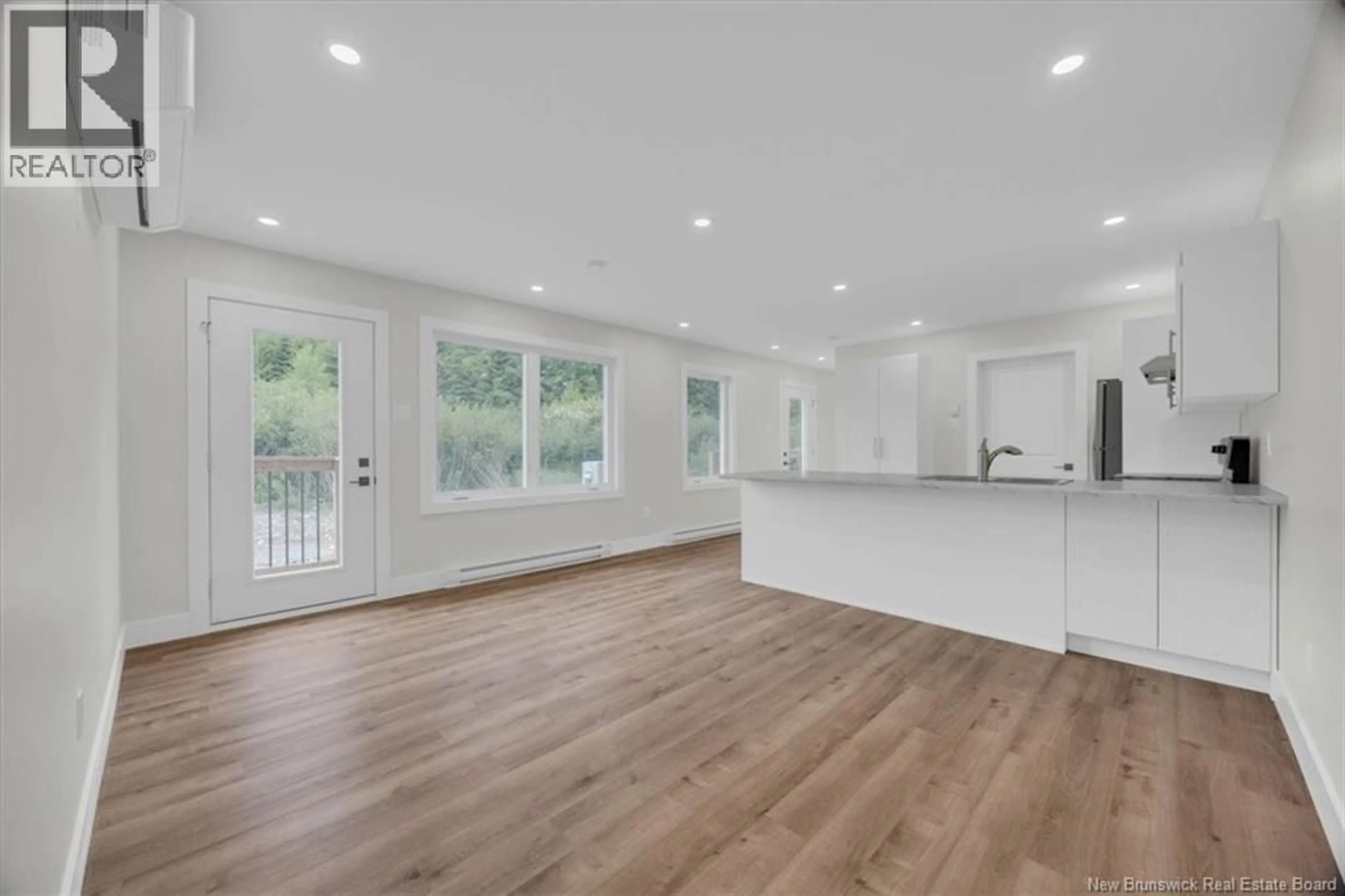 Open concept kitchen, wood/laminate floor for 20 HELENA DRIVE, Saint John New Brunswick E2J0E6