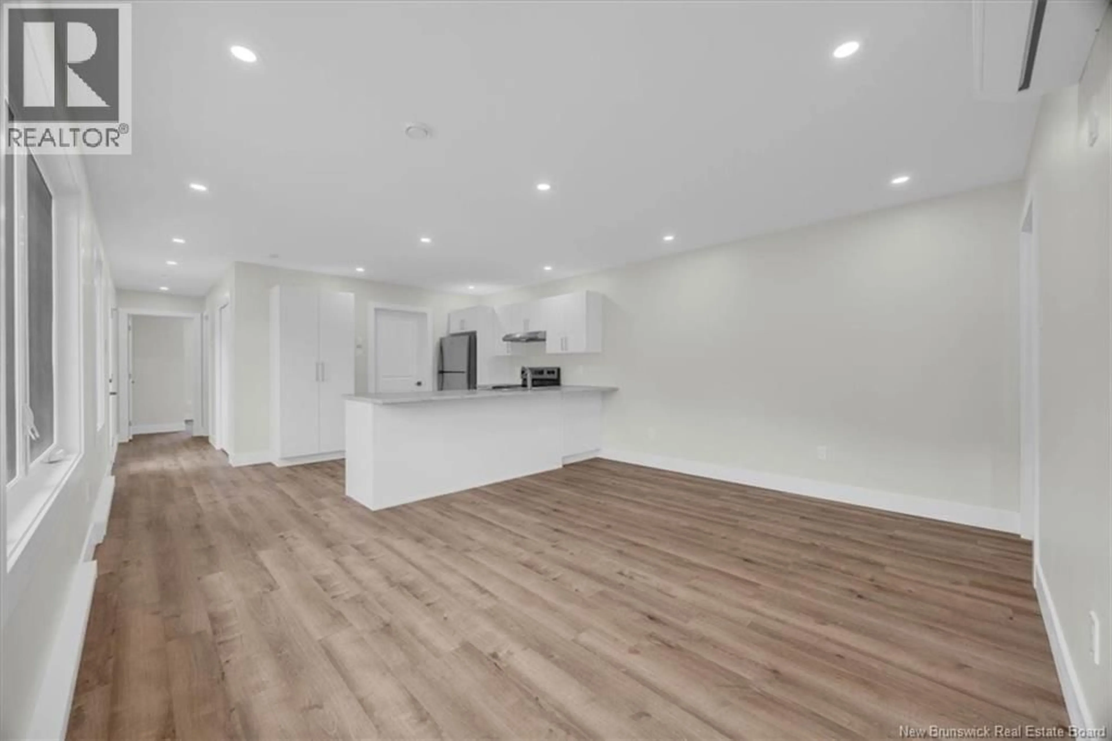 Open concept kitchen, wood/laminate floor for 20 HELENA DRIVE, Saint John New Brunswick E2J0E6