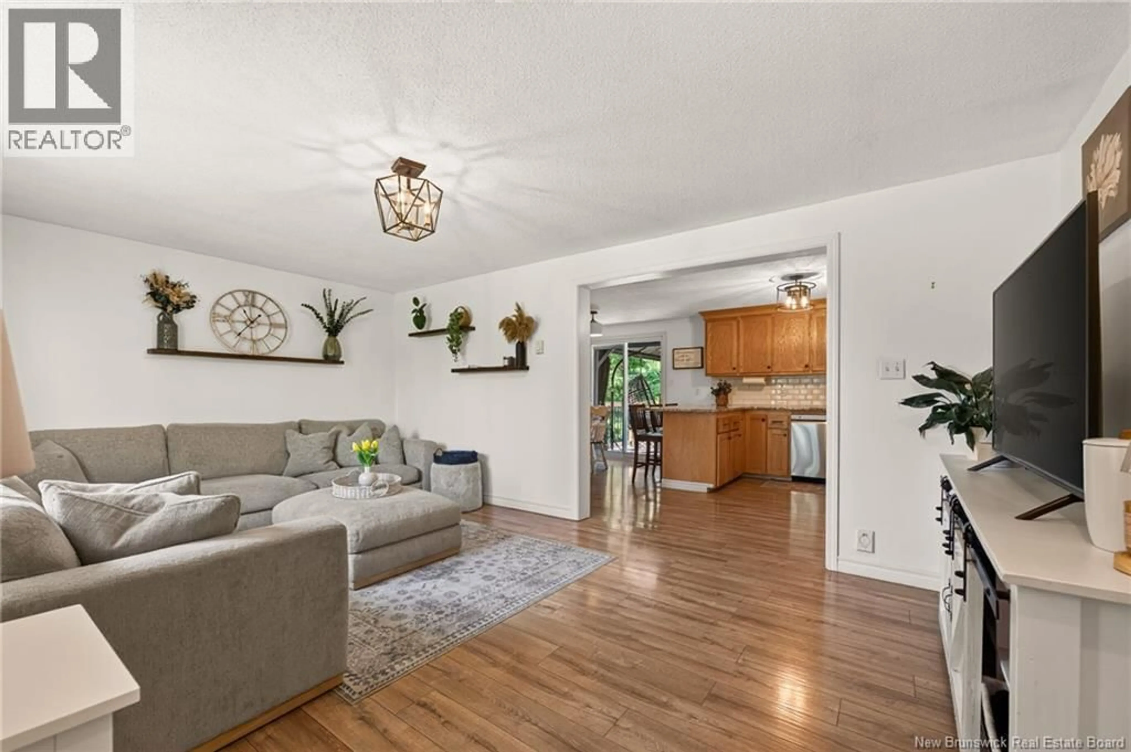 Living room with furniture, wood/laminate floor for 180 MONTEAGLE, Monteagle New Brunswick E4J1V1