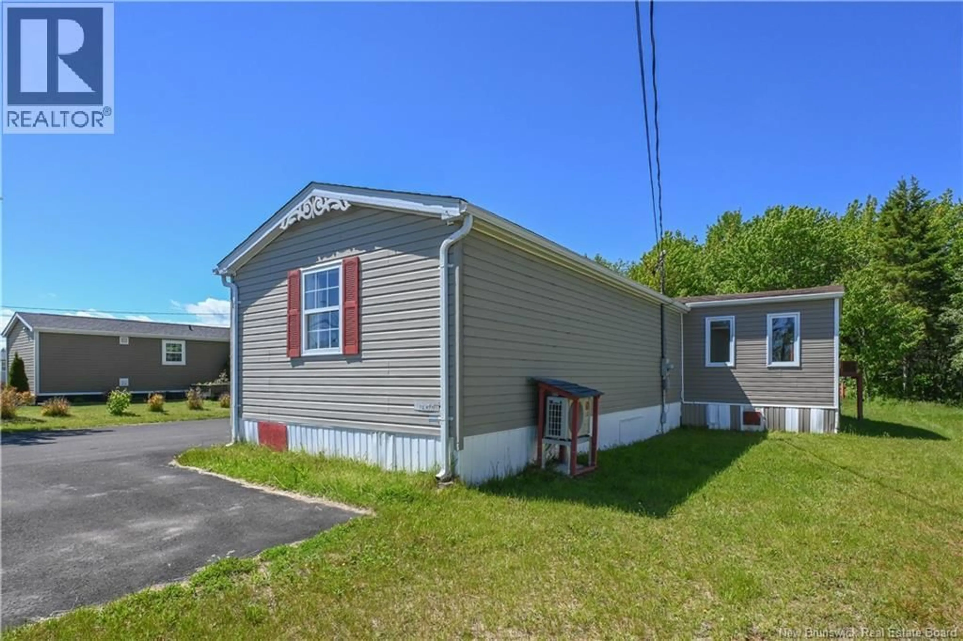 Home with vinyl exterior material, street for 277 BELLAVISTA STREET, Tracadie New Brunswick E1X4W1