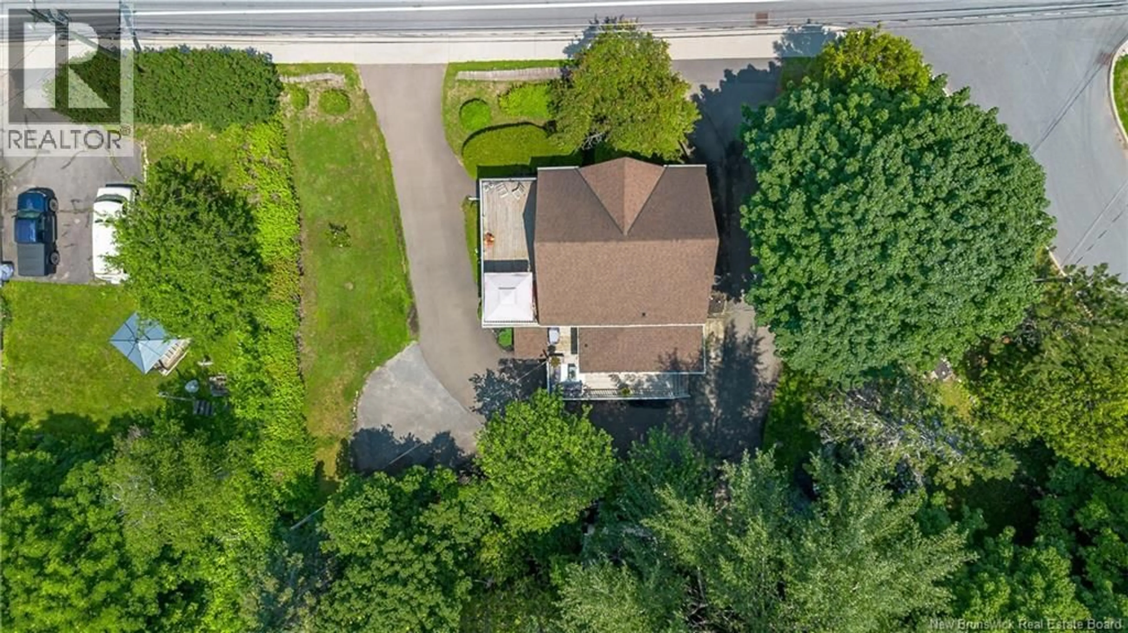 A pic from outside/outdoor area/front of a property/back of a property/a pic from drone, street for 38 FOX FARM ROAD, Rothesay New Brunswick E2H1J1