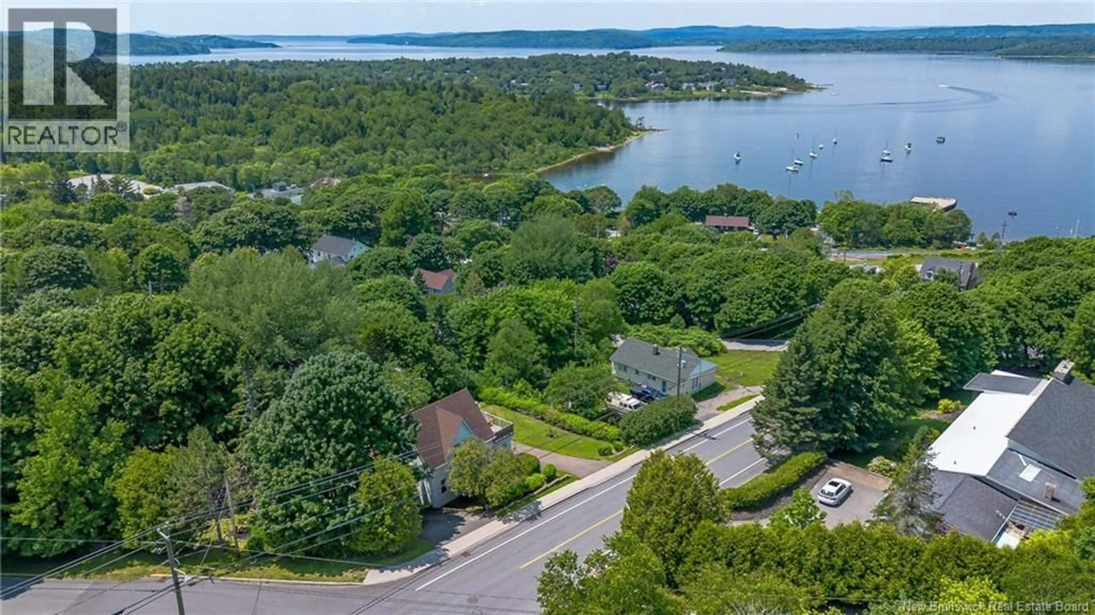 A pic from outside/outdoor area/front of a property/back of a property/a pic from drone, water/lake/river/ocean view for 38 FOX FARM ROAD, Rothesay New Brunswick E2H1J1