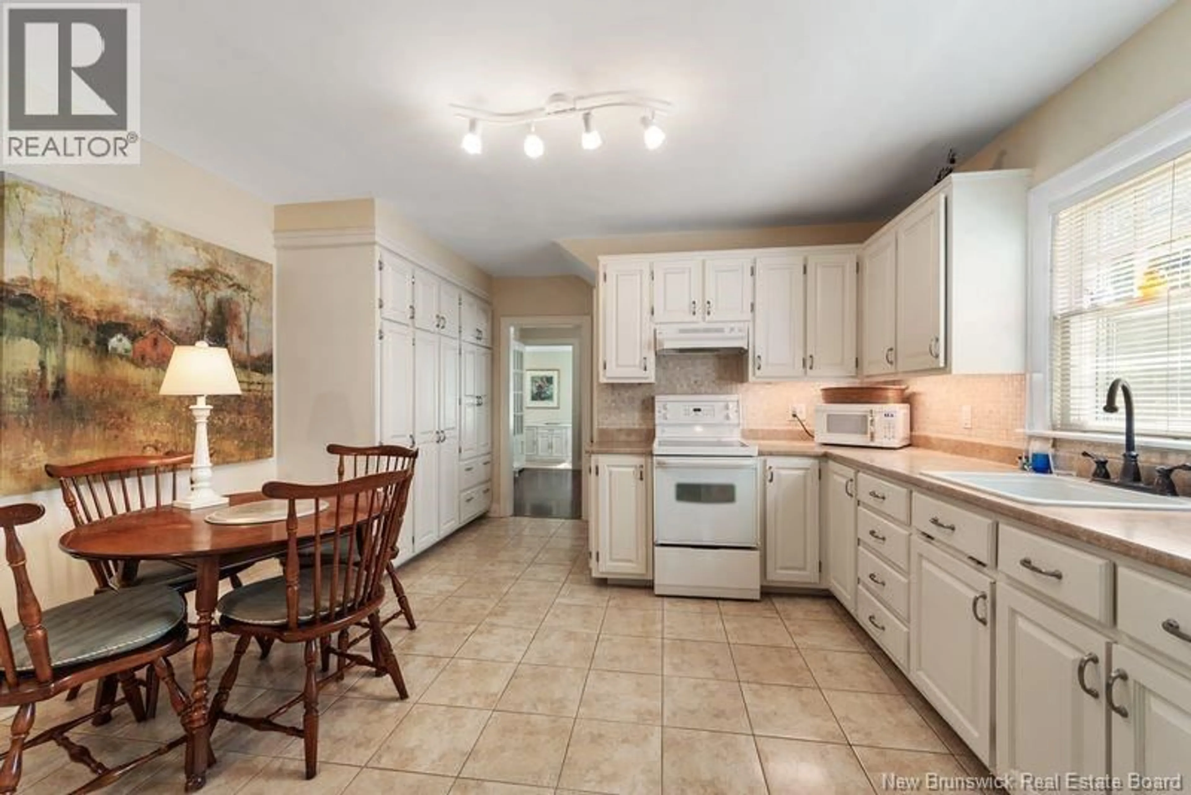 Open concept kitchen, ceramic/tile floor for 1205 AMIRAULT STREET, Dieppe New Brunswick E1A1E1