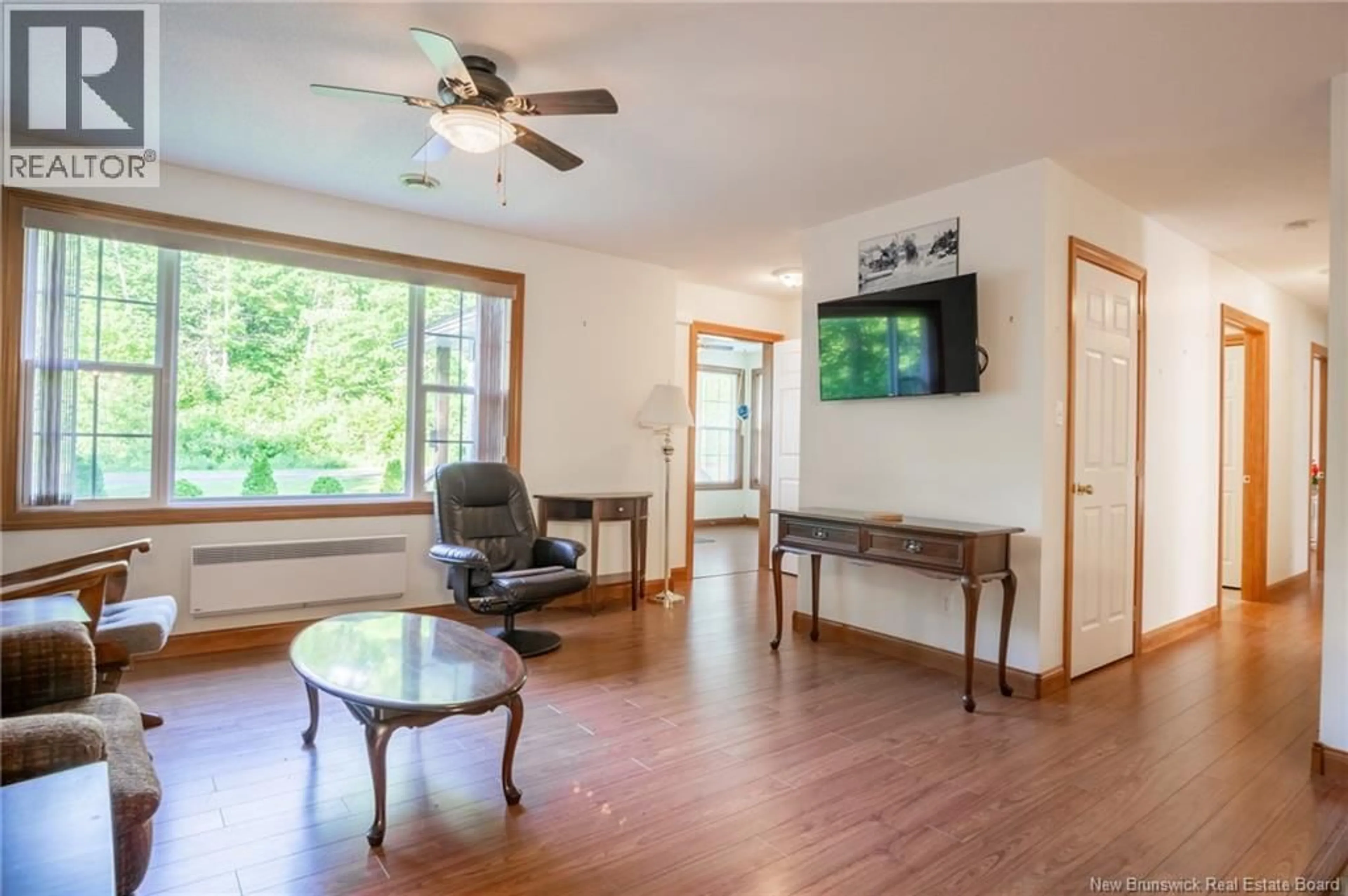 Living room with furniture, wood/laminate floor for 2254 ROUTE 760, Johnson Settlement New Brunswick E5A1S3