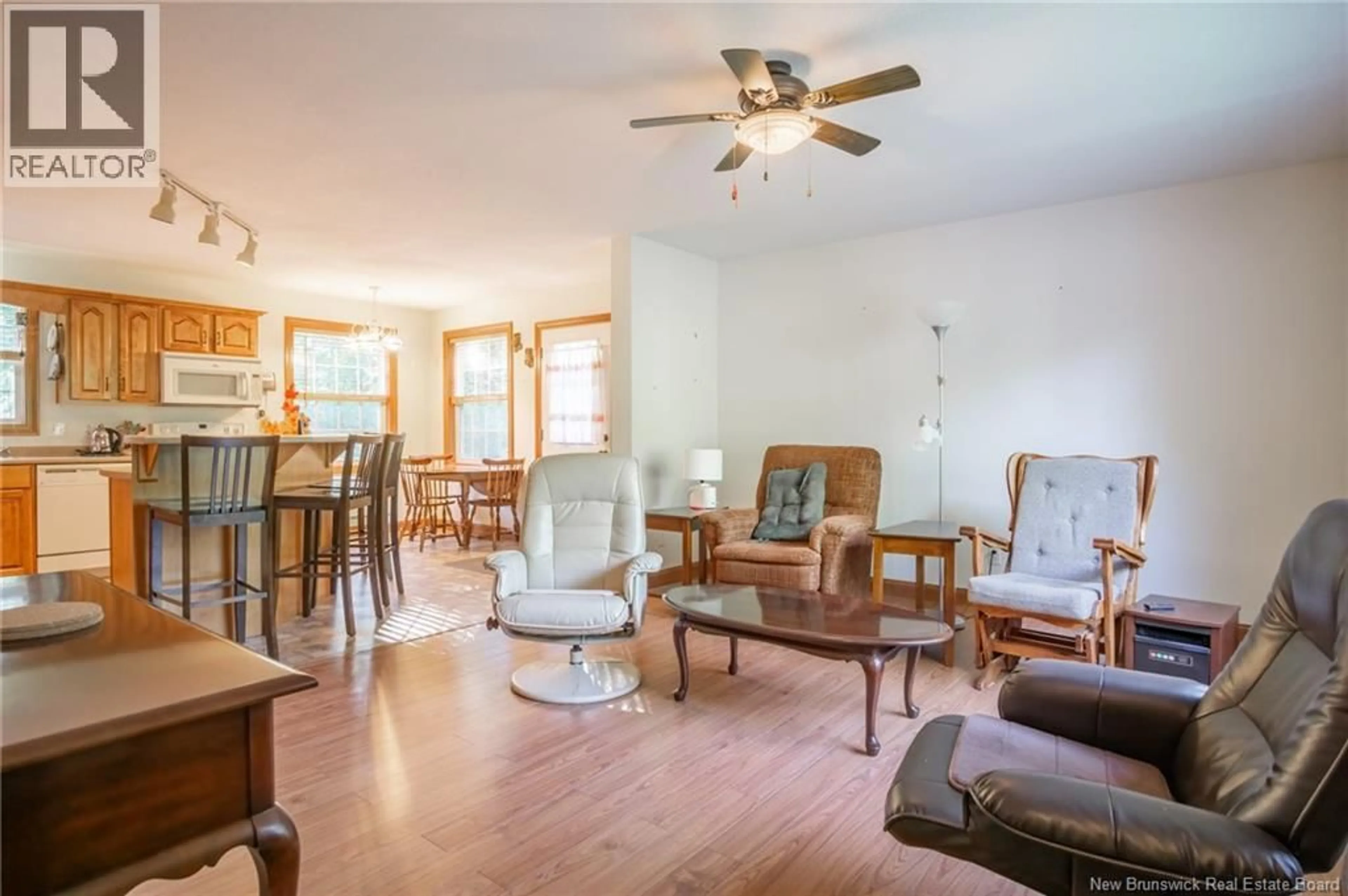 Living room with furniture, wood/laminate floor for 2254 ROUTE 760, Johnson Settlement New Brunswick E5A1S3