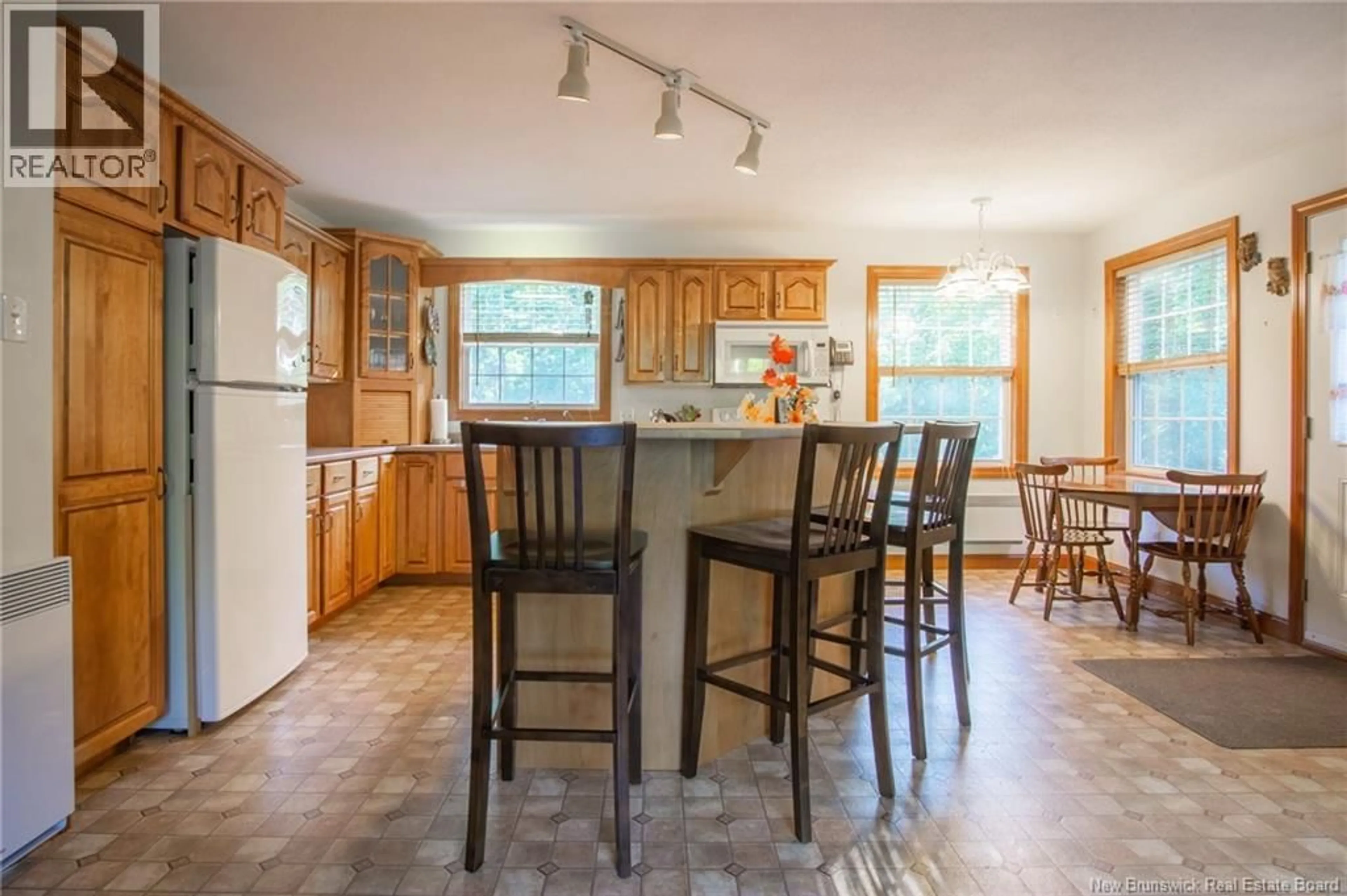 Open concept kitchen, ceramic/tile floor for 2254 ROUTE 760, Johnson Settlement New Brunswick E5A1S3