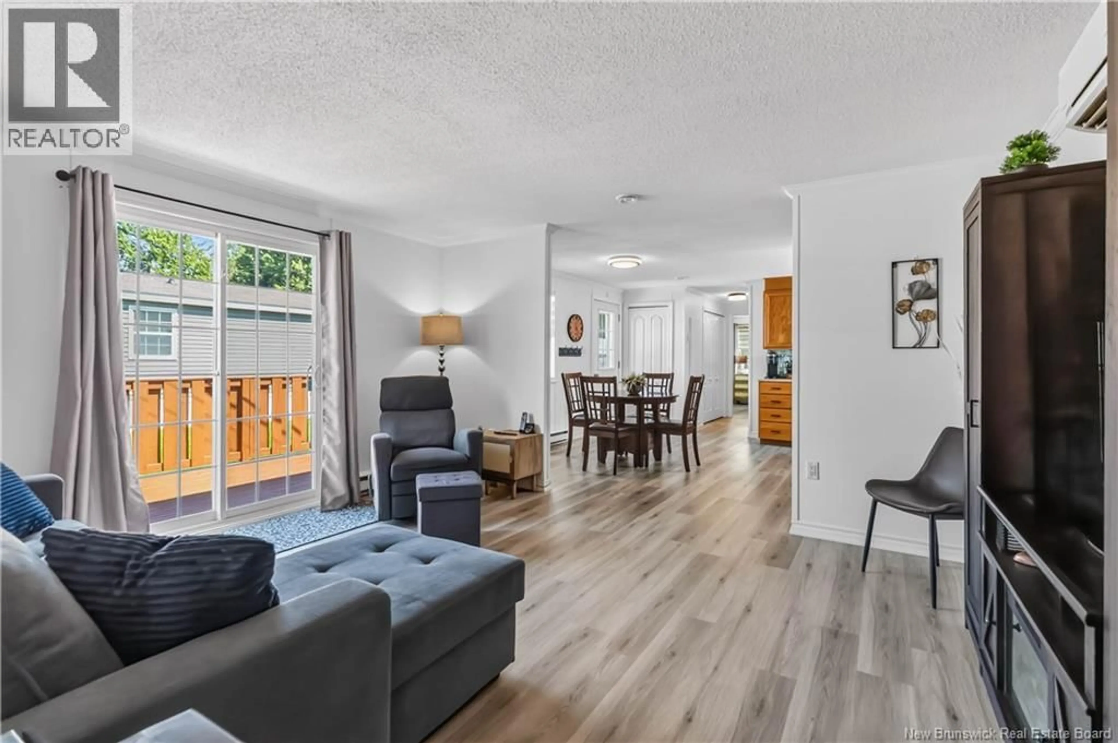 Living room with furniture, wood/laminate floor for 146 STE-CROIX STREET, Shediac New Brunswick E4P0C4