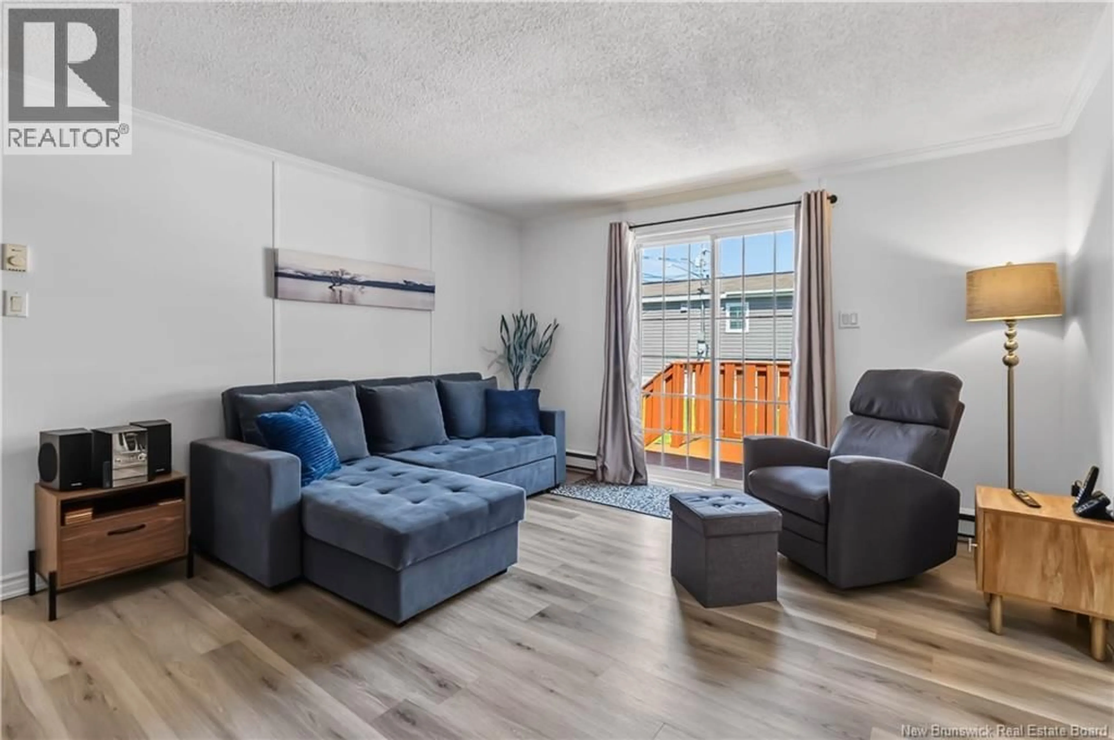 Living room with furniture, wood/laminate floor for 146 STE-CROIX STREET, Shediac New Brunswick E4P0C4