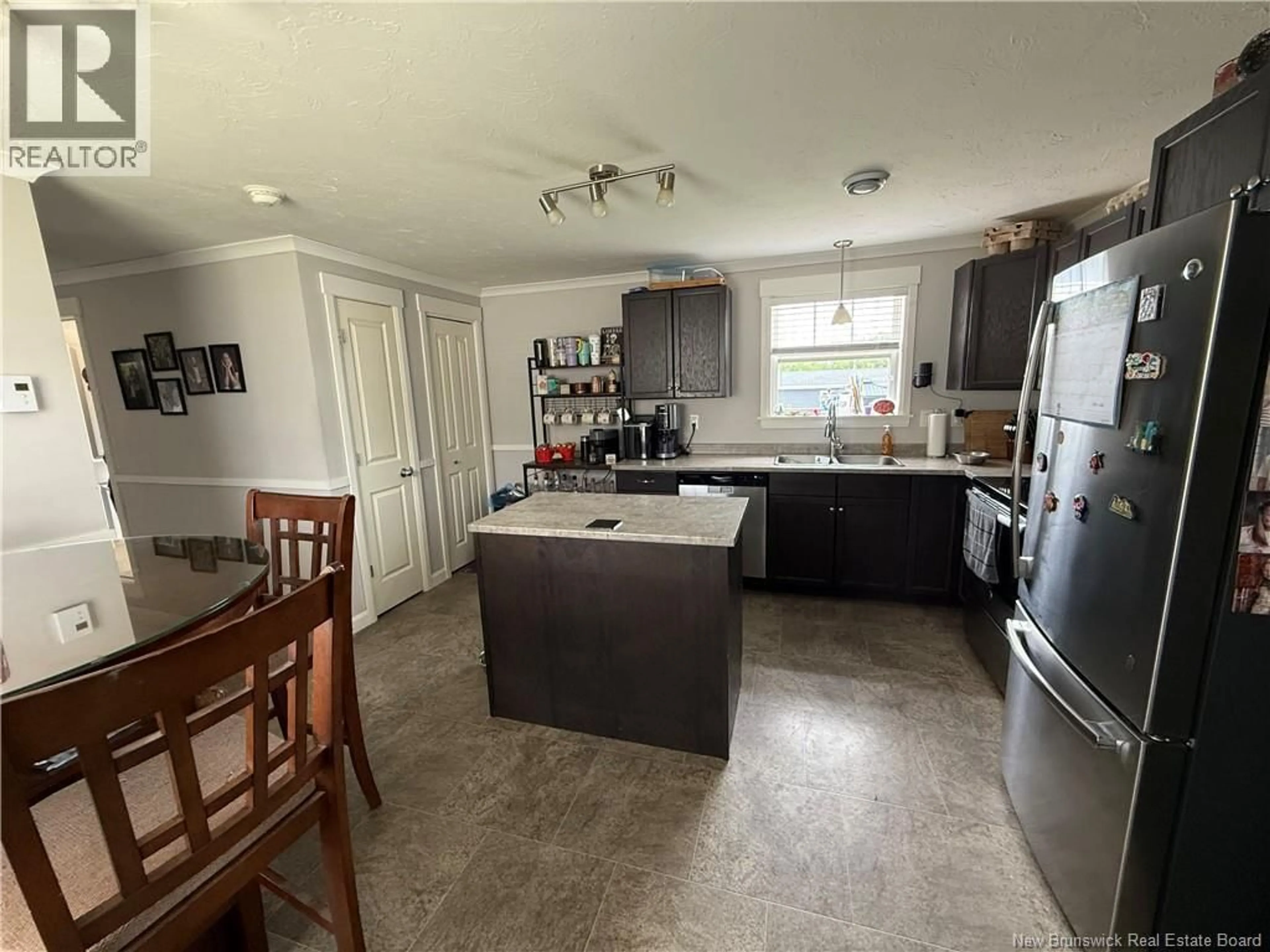 Open concept kitchen, ceramic/tile floor for 230 BONAVENTURE STREET, Shediac New Brunswick E4P0H1