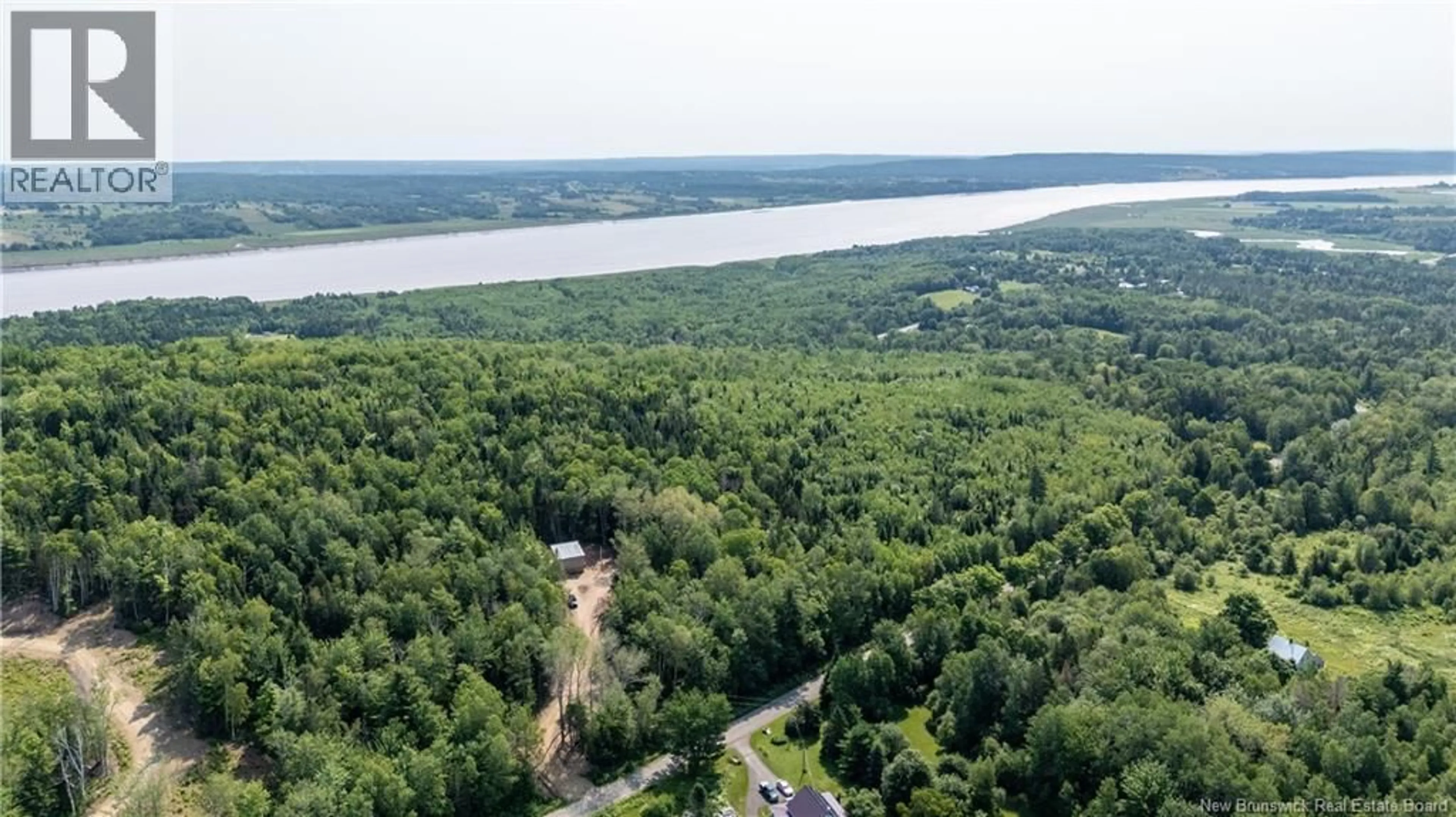 A pic from outside/outdoor area/front of a property/back of a property/a pic from drone, water/lake/river/ocean view for 110 BEECH HILL, Weldon New Brunswick E4H4N5