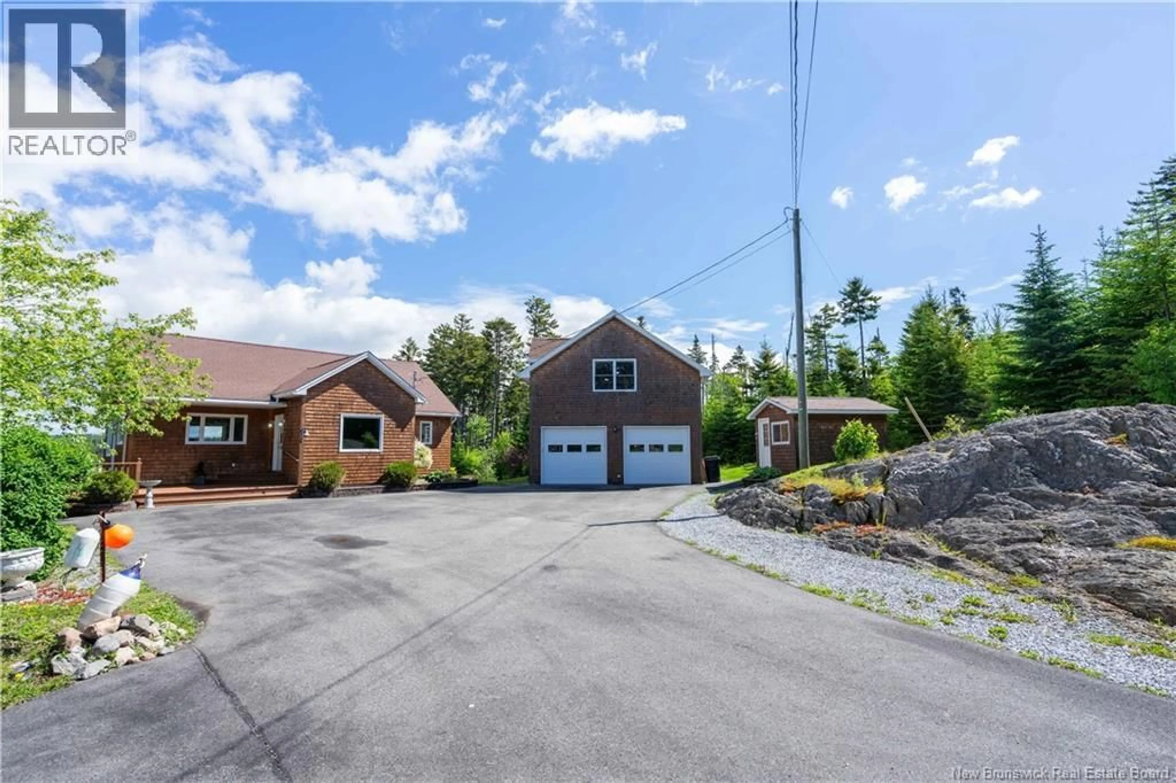 A pic from outside/outdoor area/front of a property/back of a property/a pic from drone, street for 87 HAGGERTYS COVE ROAD, New River Beach New Brunswick E5J1J9