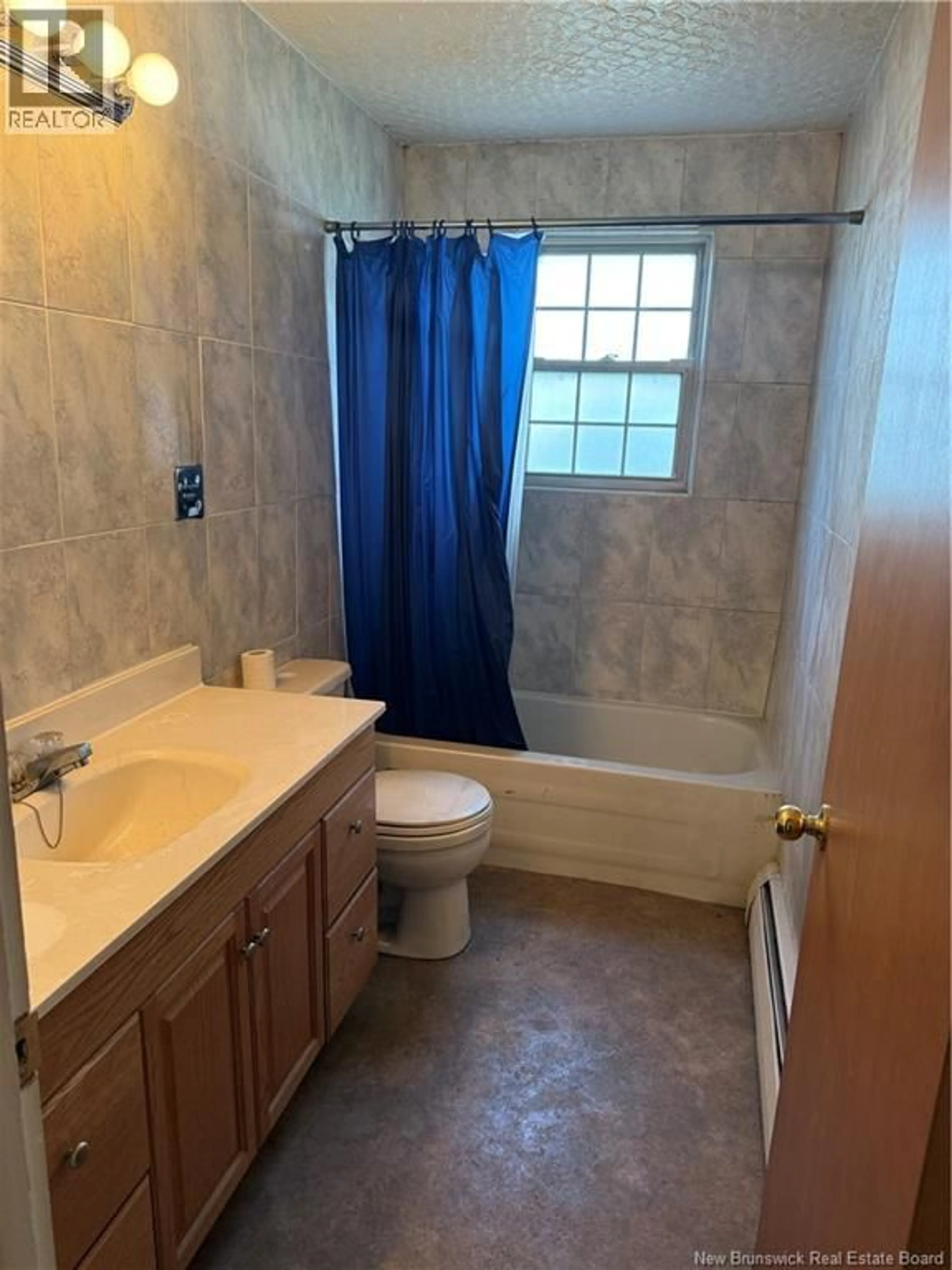 Standard bathroom, ceramic/tile floor for 62 DERBY STREET, Moncton New Brunswick E1C6Y7