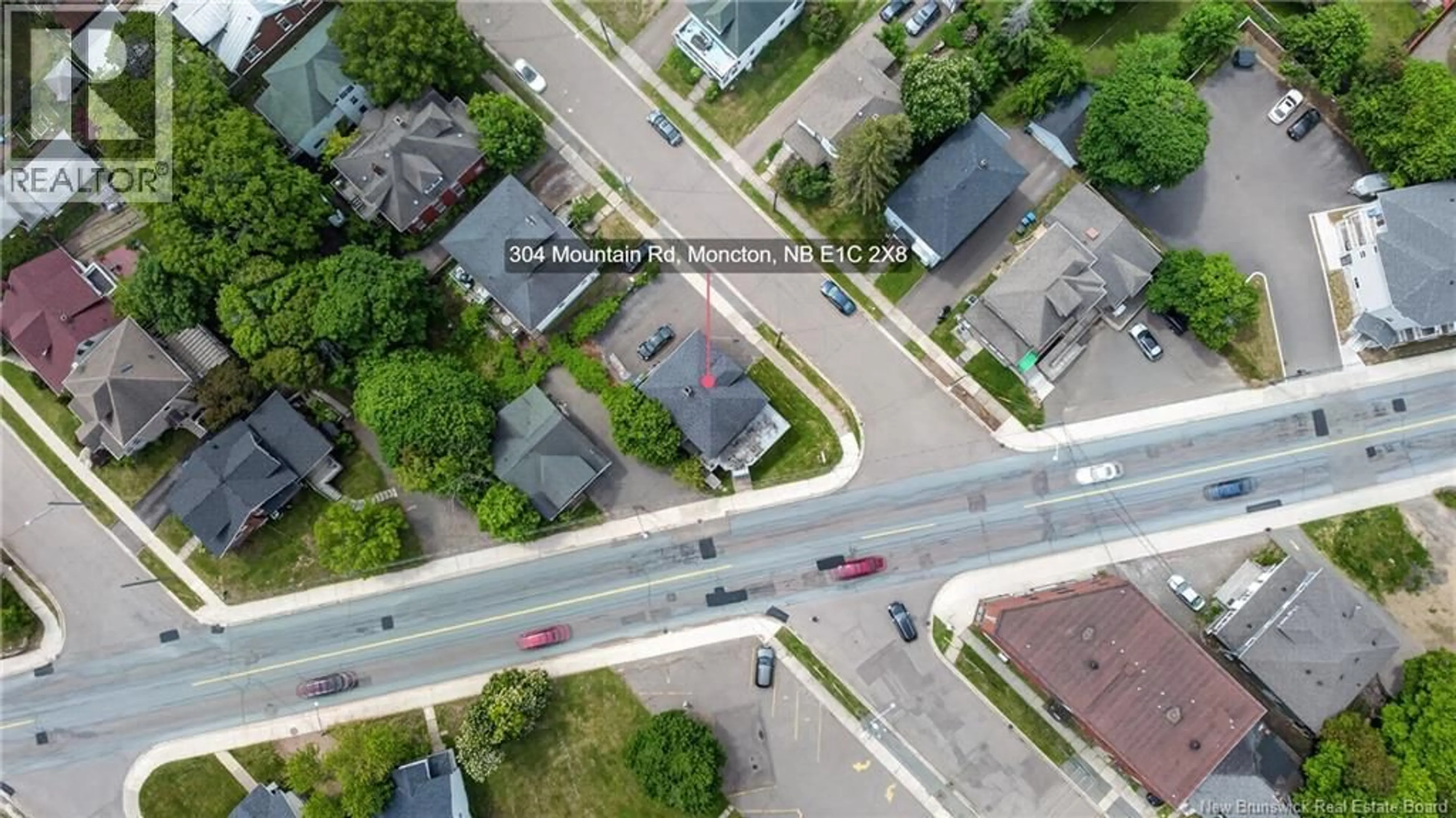 A pic from outside/outdoor area/front of a property/back of a property/a pic from drone, street for 300-304 MOUNTAIN ROAD, Moncton New Brunswick E1C2X8