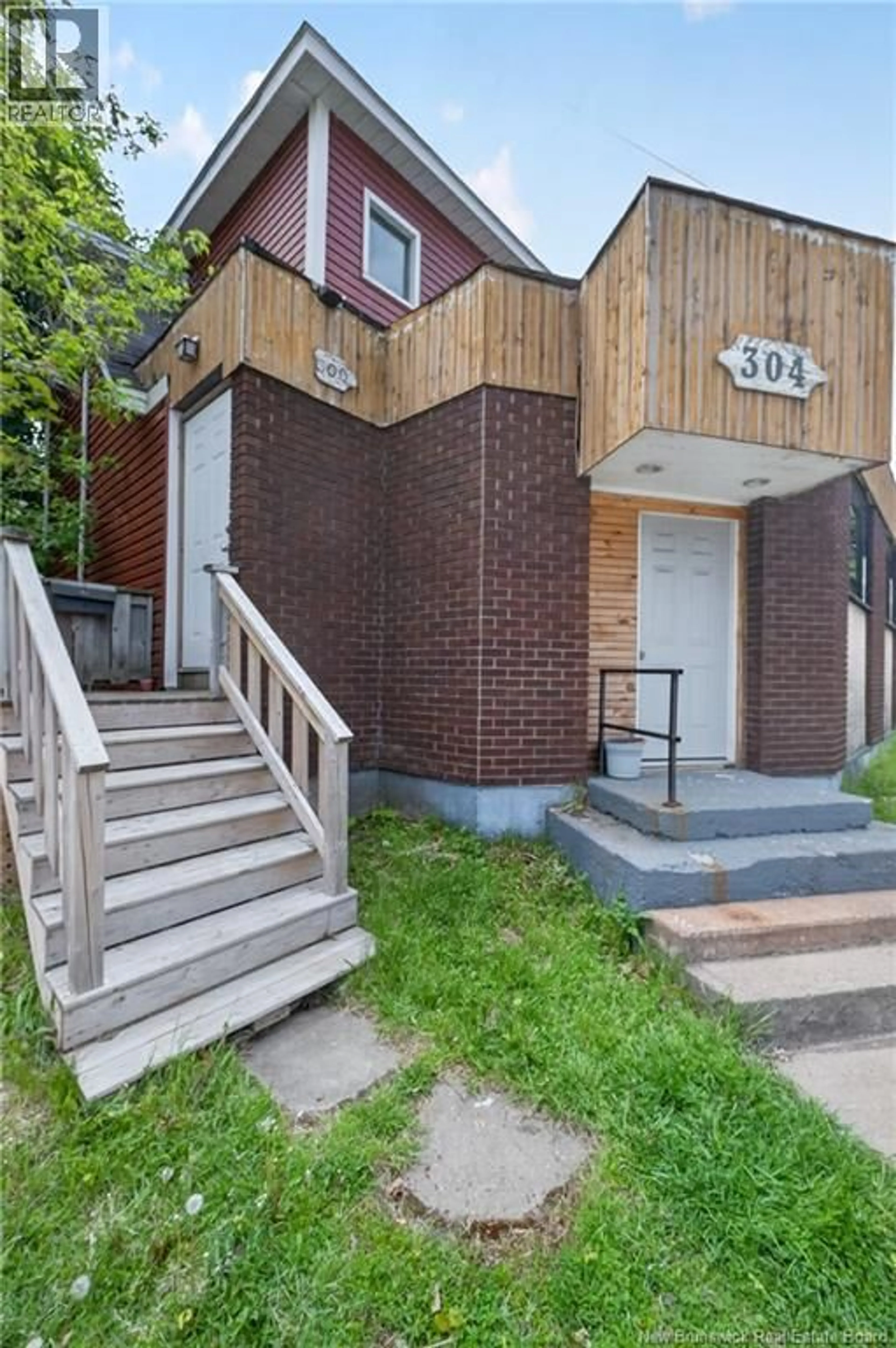 Home with brick exterior material, unknown for 300-304 MOUNTAIN ROAD, Moncton New Brunswick E1C2X8