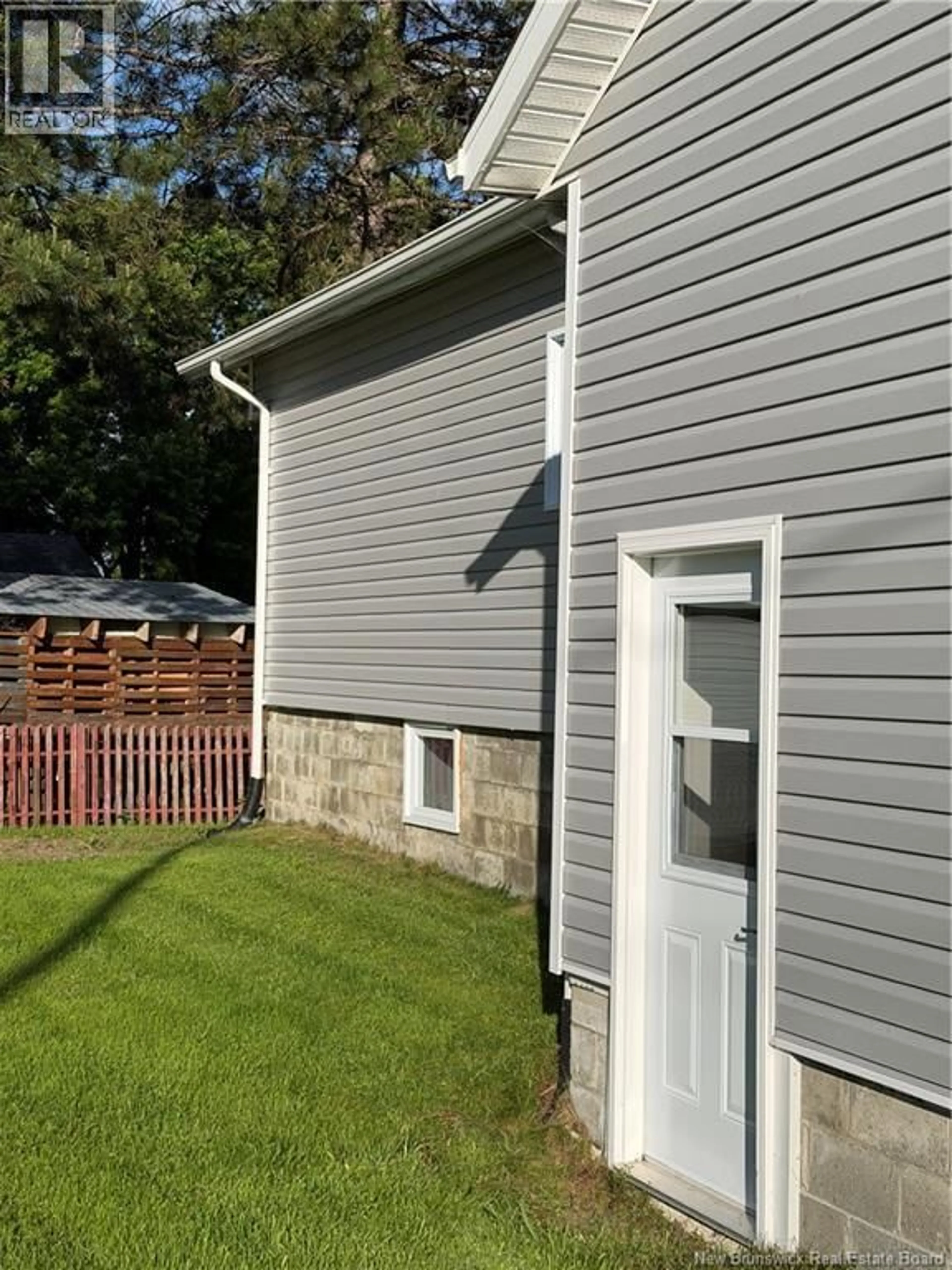 Home with vinyl exterior material, street for 4 ST-JEAN STREET, Saint-François-de-Madawaska New Brunswick E7A1E8
