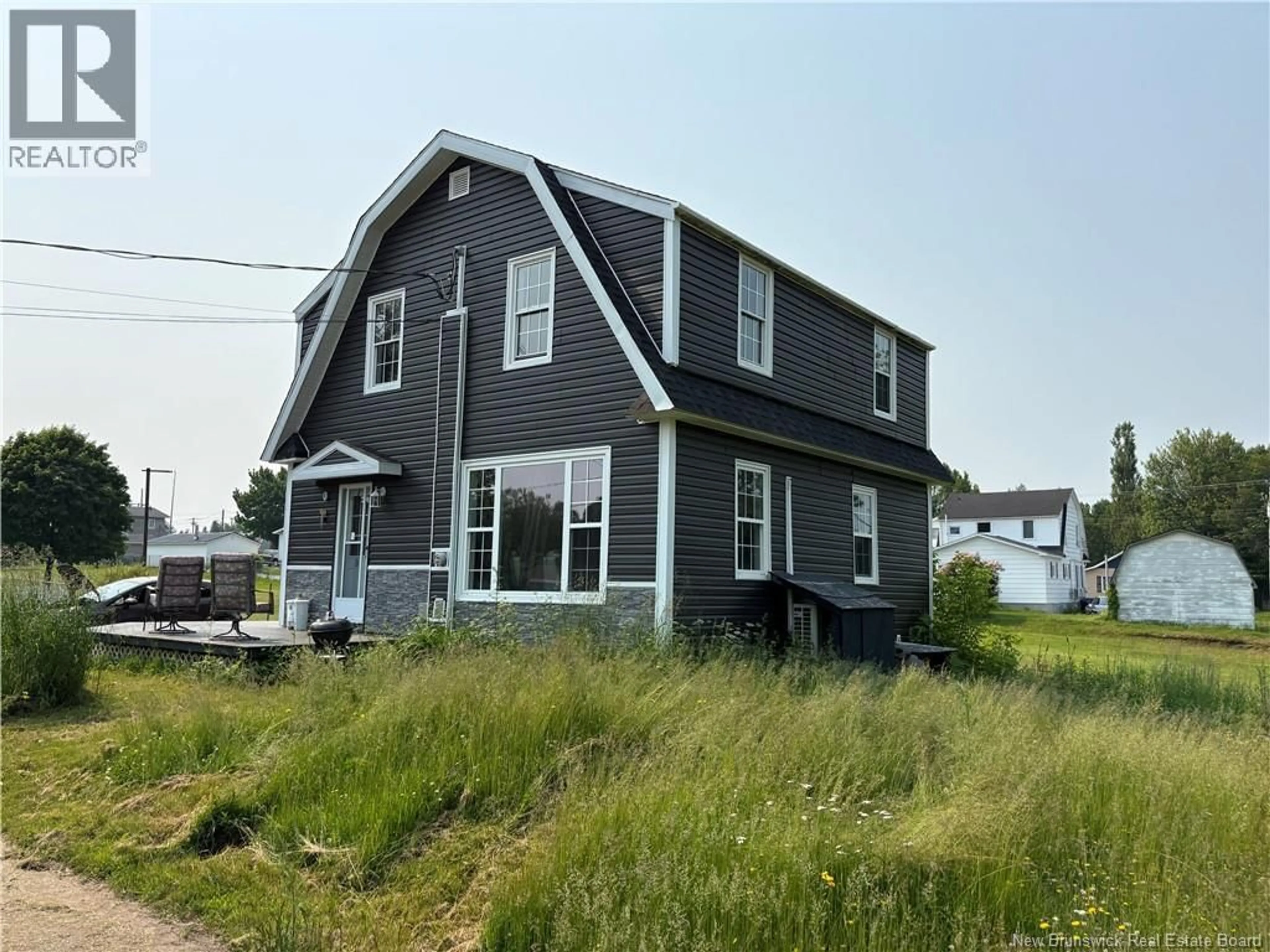 Home with vinyl exterior material, street for 1186 FRENETTE STREET, Bathurst New Brunswick E2A1Y6