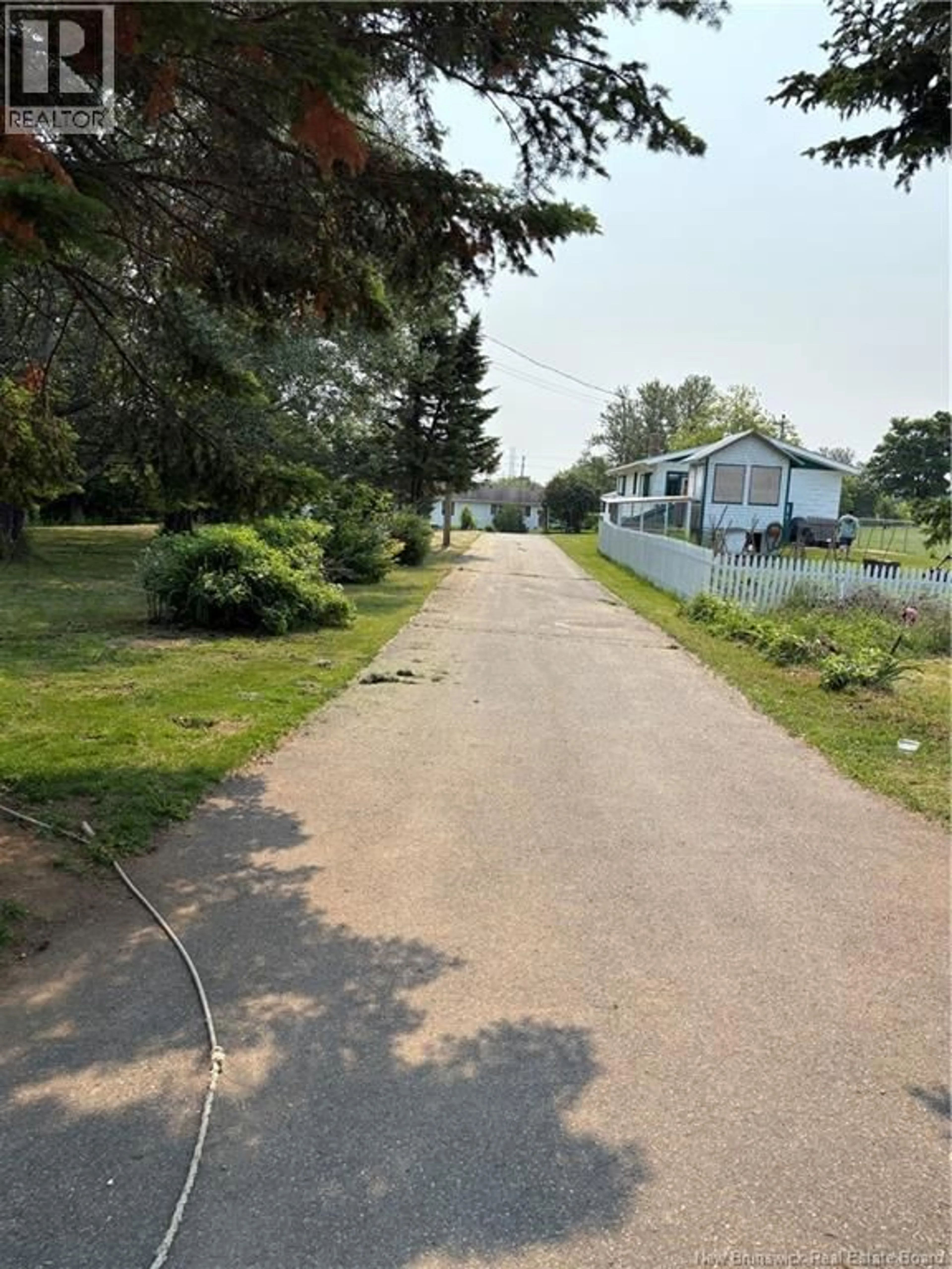 A pic from outside/outdoor area/front of a property/back of a property/a pic from drone, street for 1186 FRENETTE STREET, Bathurst New Brunswick E2A1Y6