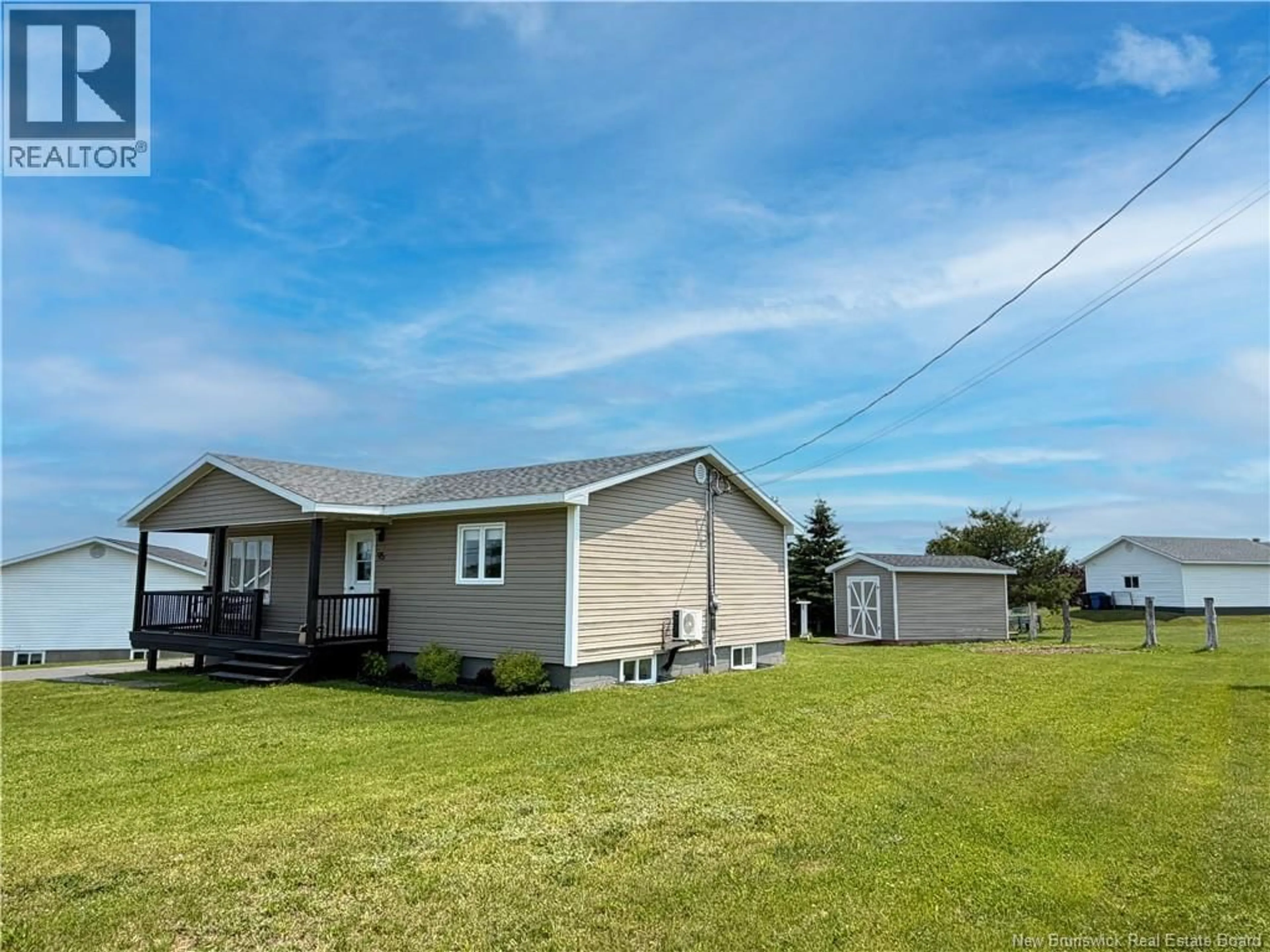 A pic from outside/outdoor area/front of a property/back of a property/a pic from drone, water/lake/river/ocean view for 95 RUE DESJASDINS, Petit-Rocher New Brunswick E8J1N3