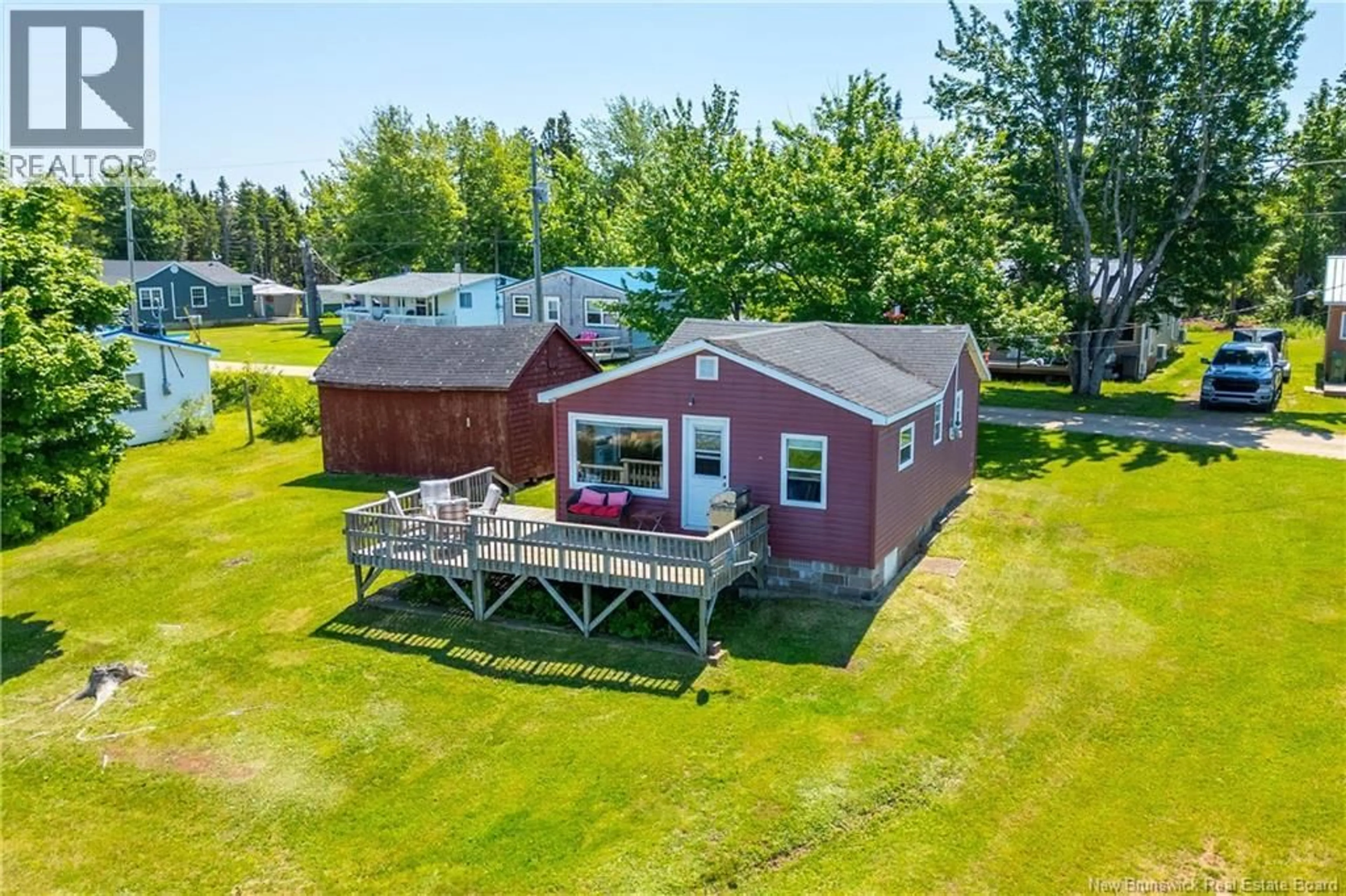 A pic from outside/outdoor area/front of a property/back of a property/a pic from drone, water/lake/river/ocean view for 66 MASON'S BEACH, Baie Verte New Brunswick E4M2Y2