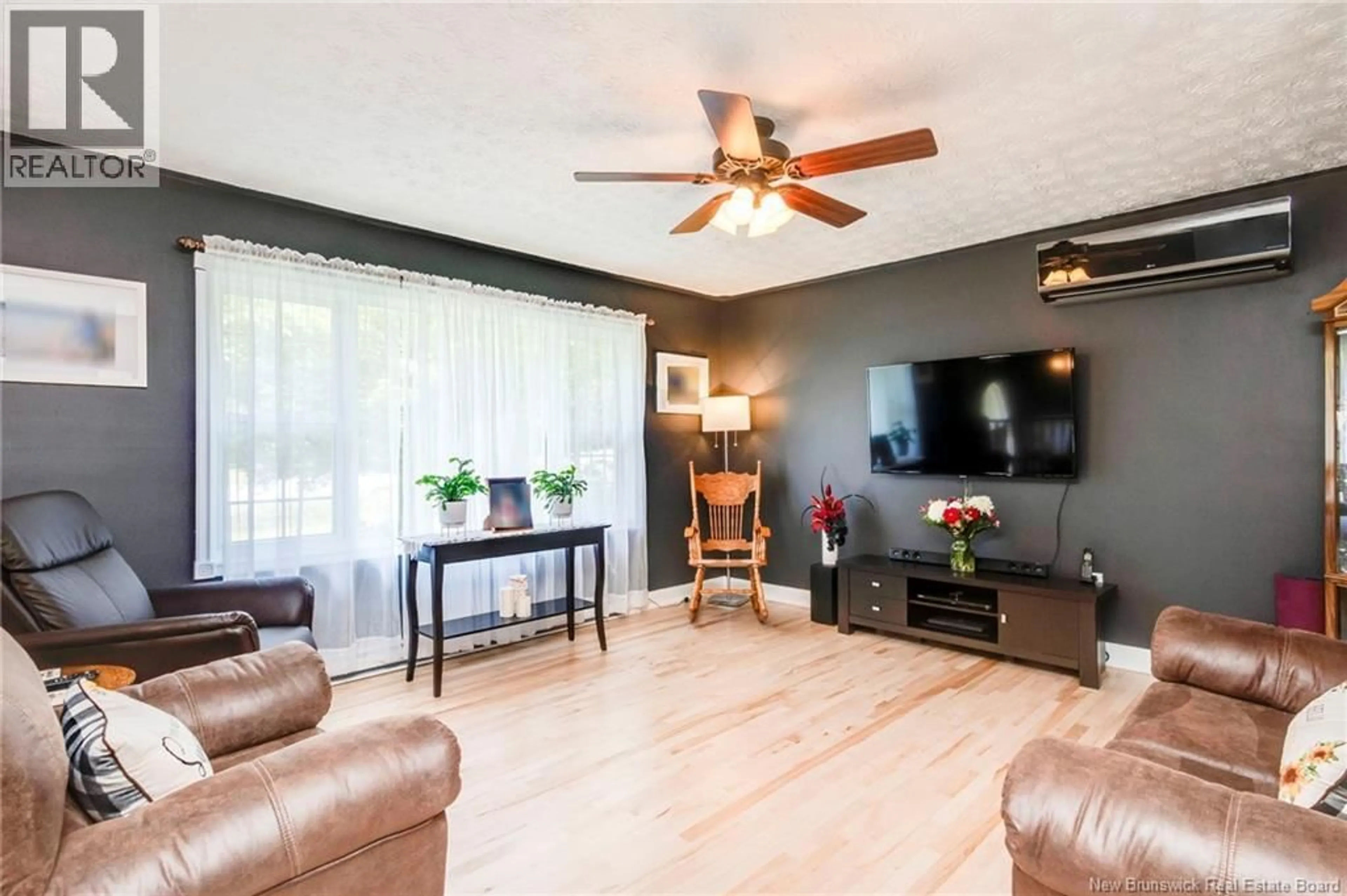 Living room with furniture, wood/laminate floor for 9 ANNA AVENUE, Rothesay New Brunswick E2S1A3
