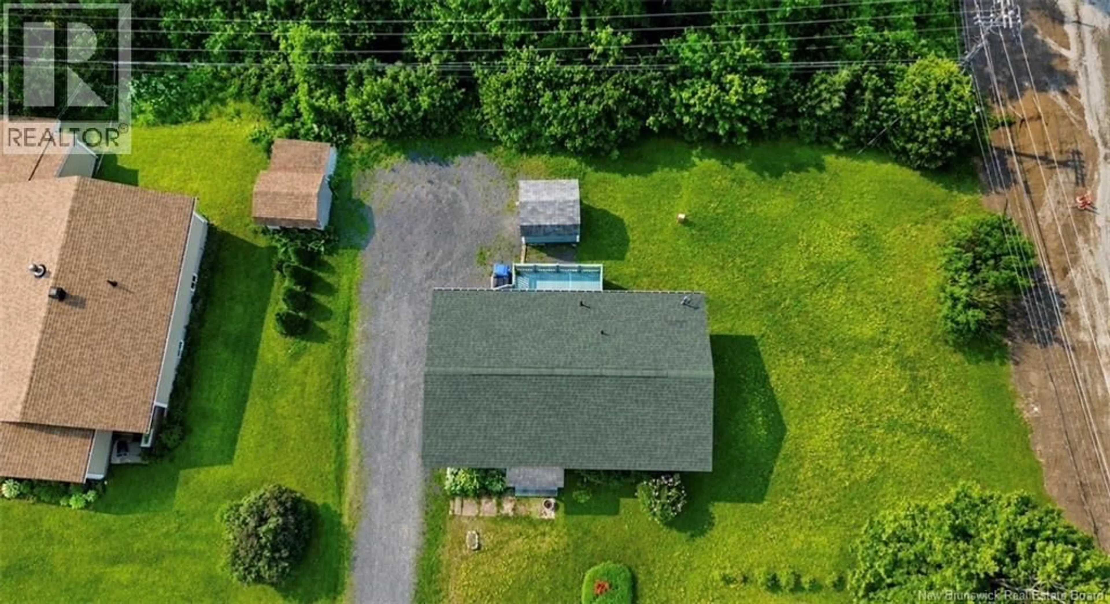 A pic from outside/outdoor area/front of a property/back of a property/a pic from drone, unknown for 1285 VANIER, Bathurst New Brunswick E2A3N6