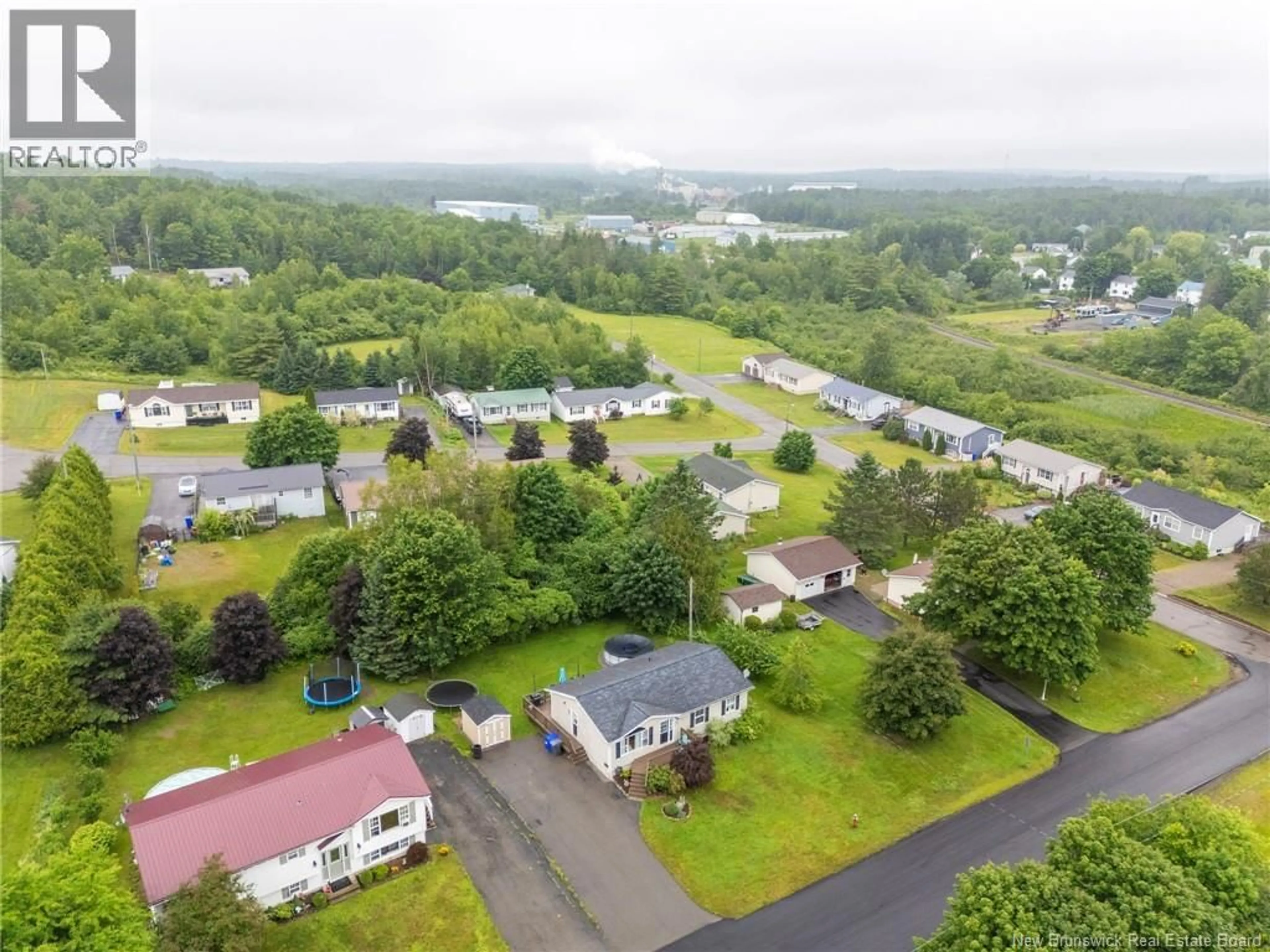 A pic from outside/outdoor area/front of a property/back of a property/a pic from drone, water/lake/river/ocean view for 5 SINCLAIR STREET, St. Stephen New Brunswick E3L3C8
