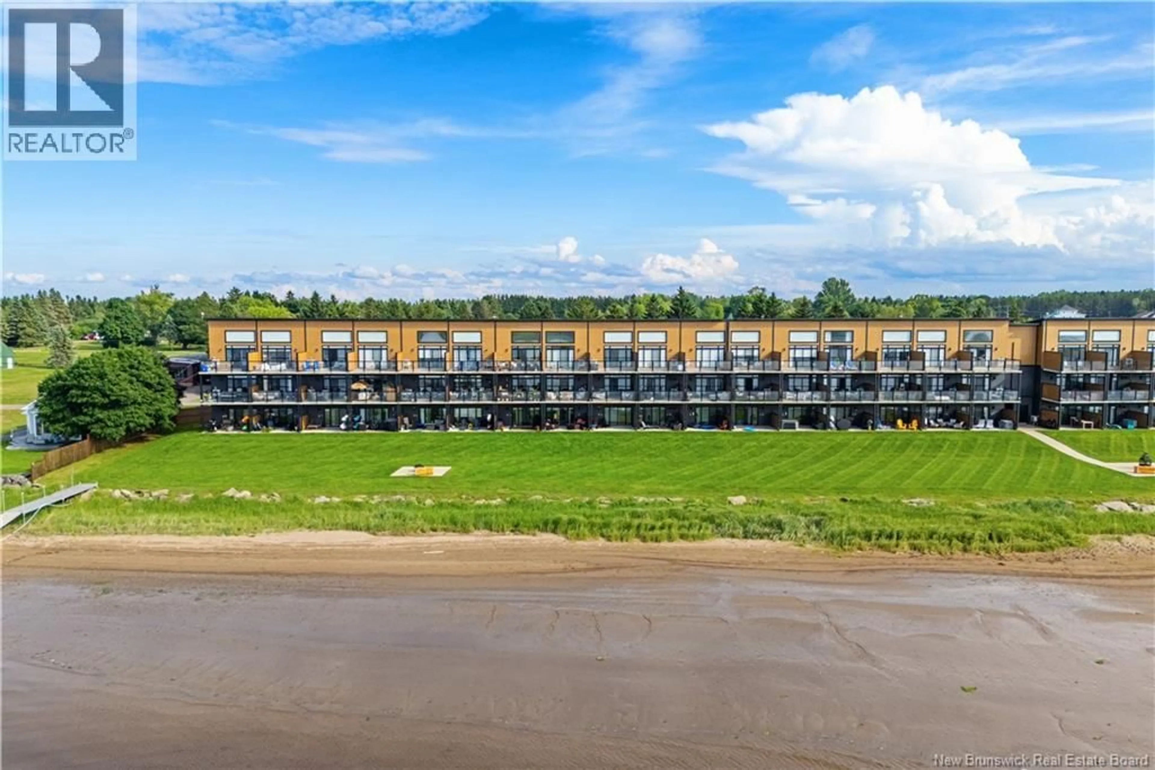 A pic from outside/outdoor area/front of a property/back of a property/a pic from drone, water/lake/river/ocean view for 107 - 3808 ROUTE 134, Shediac Bridge New Brunswick E4R1T5