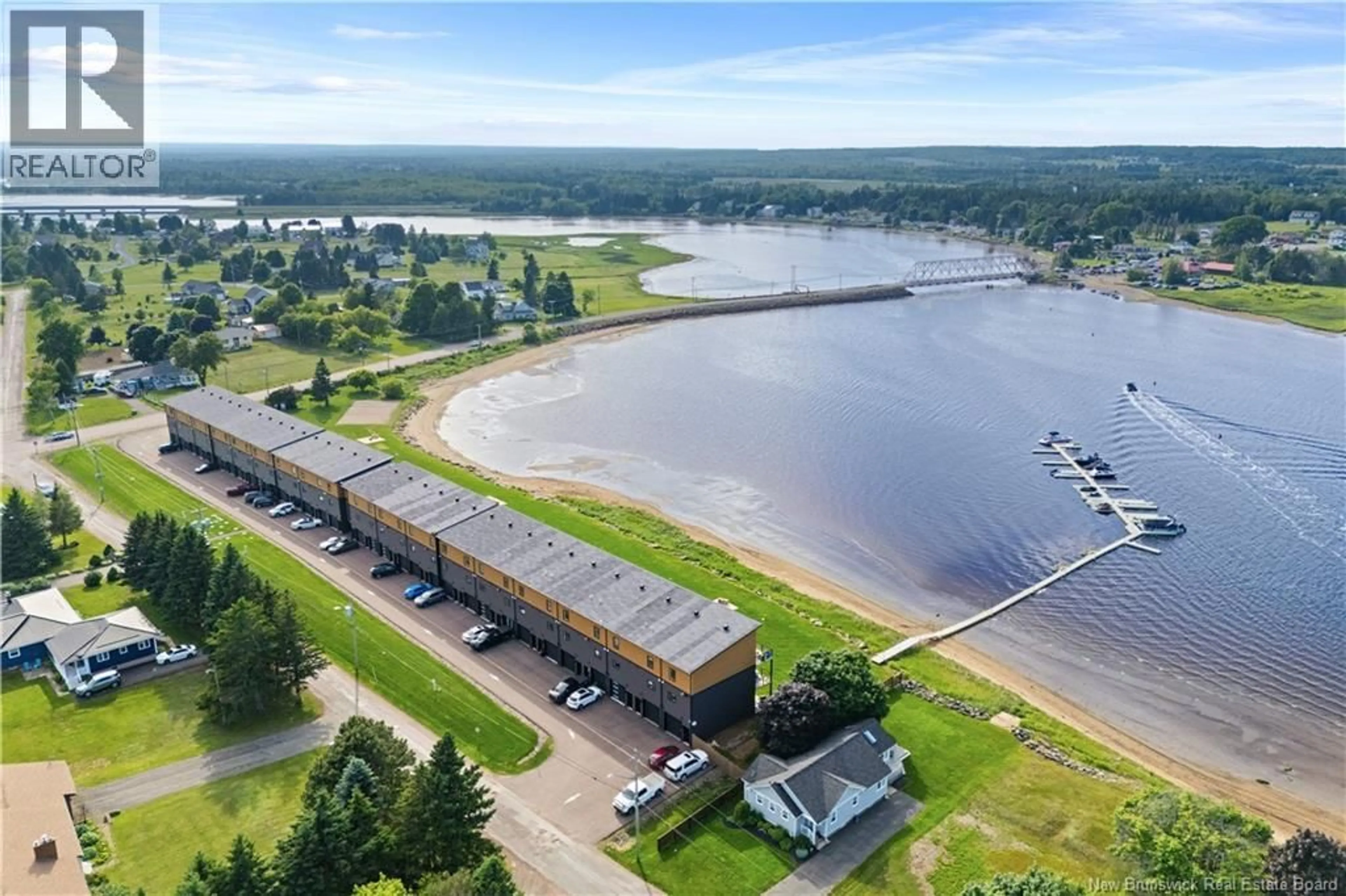 A pic from outside/outdoor area/front of a property/back of a property/a pic from drone, water/lake/river/ocean view for 107 - 3808 ROUTE 134, Shediac Bridge New Brunswick E4R1T5