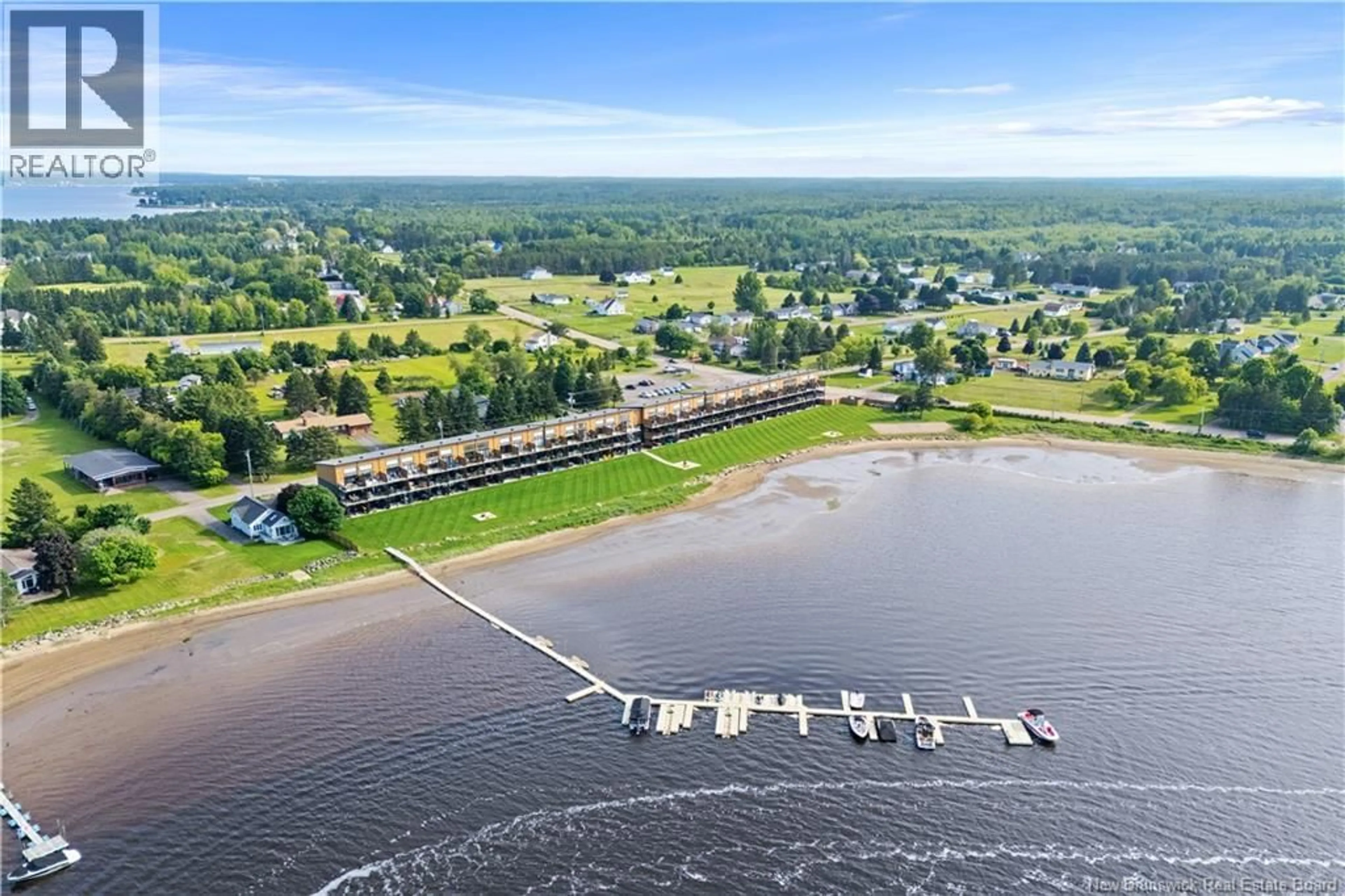 A pic from outside/outdoor area/front of a property/back of a property/a pic from drone, water/lake/river/ocean view for 107 - 3808 ROUTE 134, Shediac Bridge New Brunswick E4R1T5