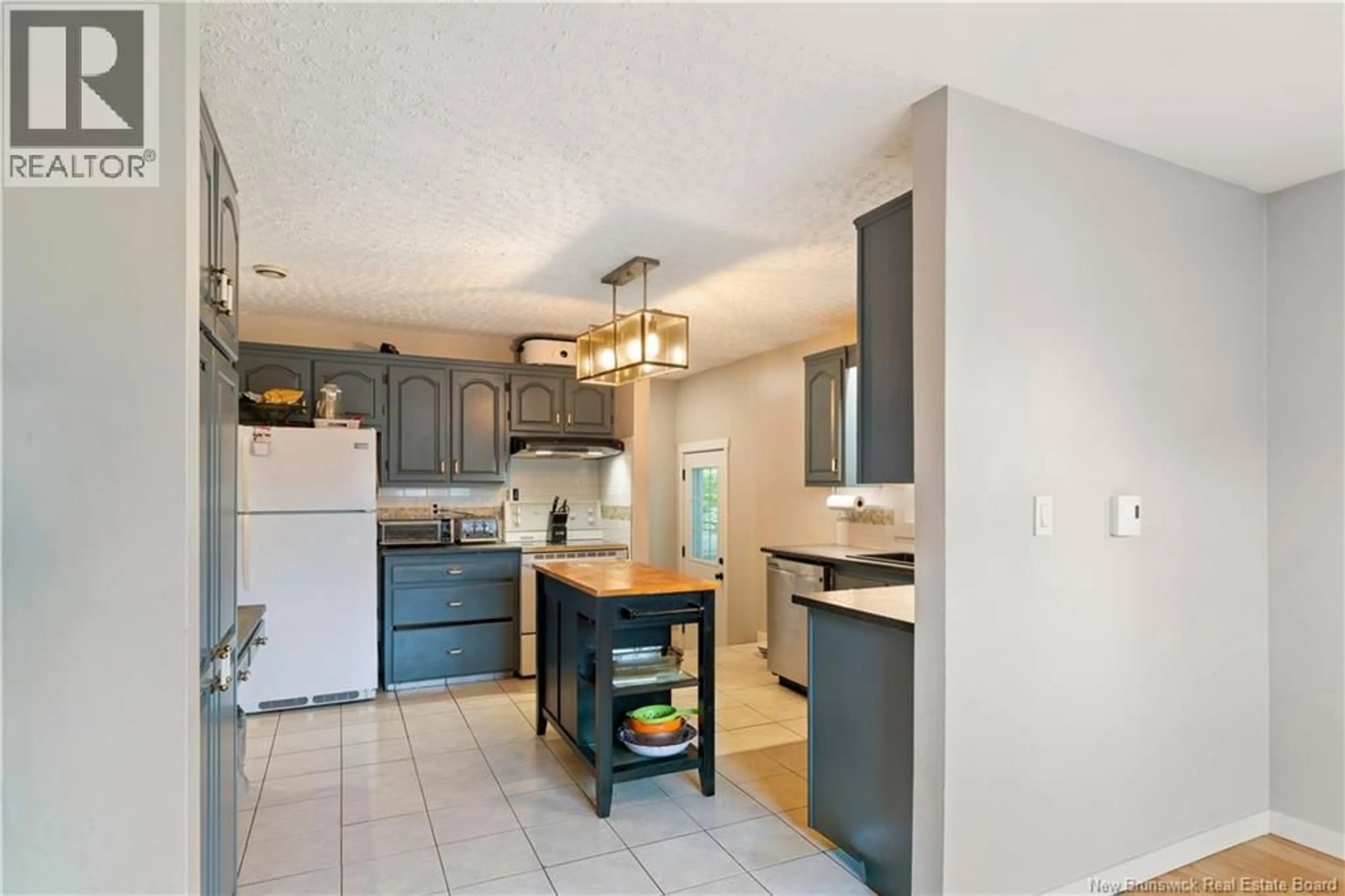 Open concept kitchen, ceramic/tile floor for 307 ROBERVAL STREET, Dieppe New Brunswick E1A4V3