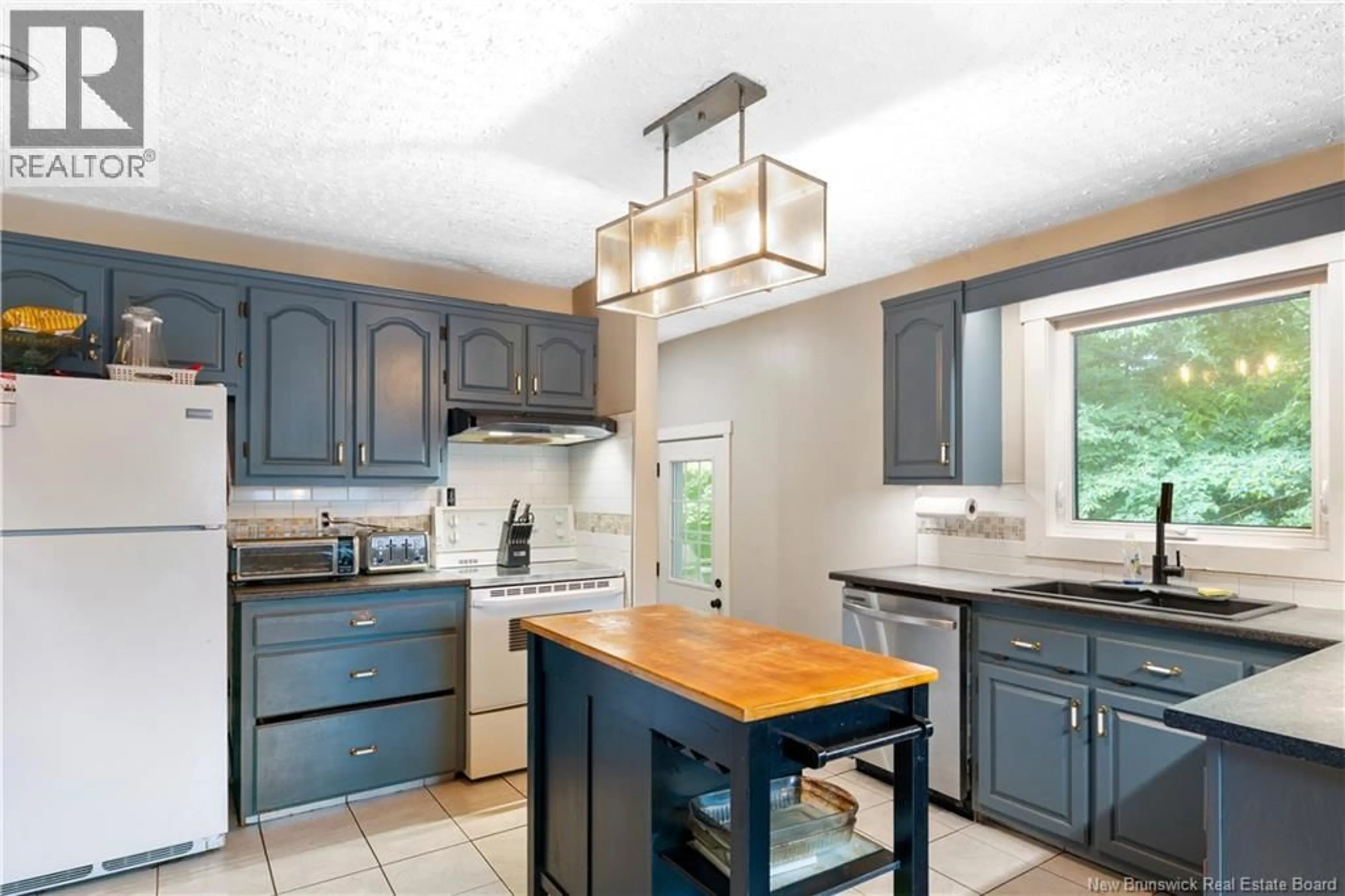 Open concept kitchen, ceramic/tile floor for 307 ROBERVAL STREET, Dieppe New Brunswick E1A4V3