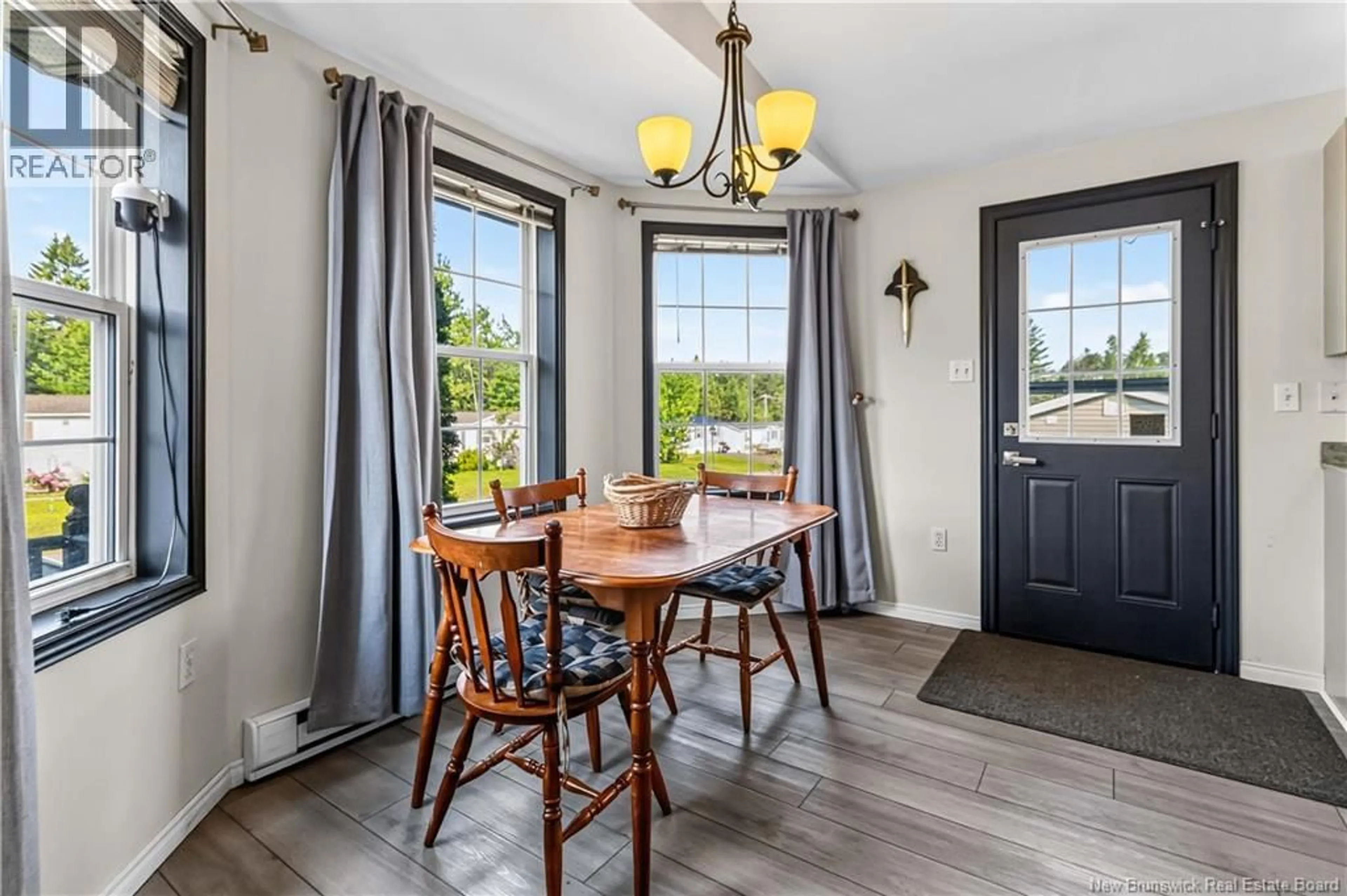 Dining room, wood/laminate floor for 1 CONVERSE LANE, Riverview New Brunswick E1B5J3