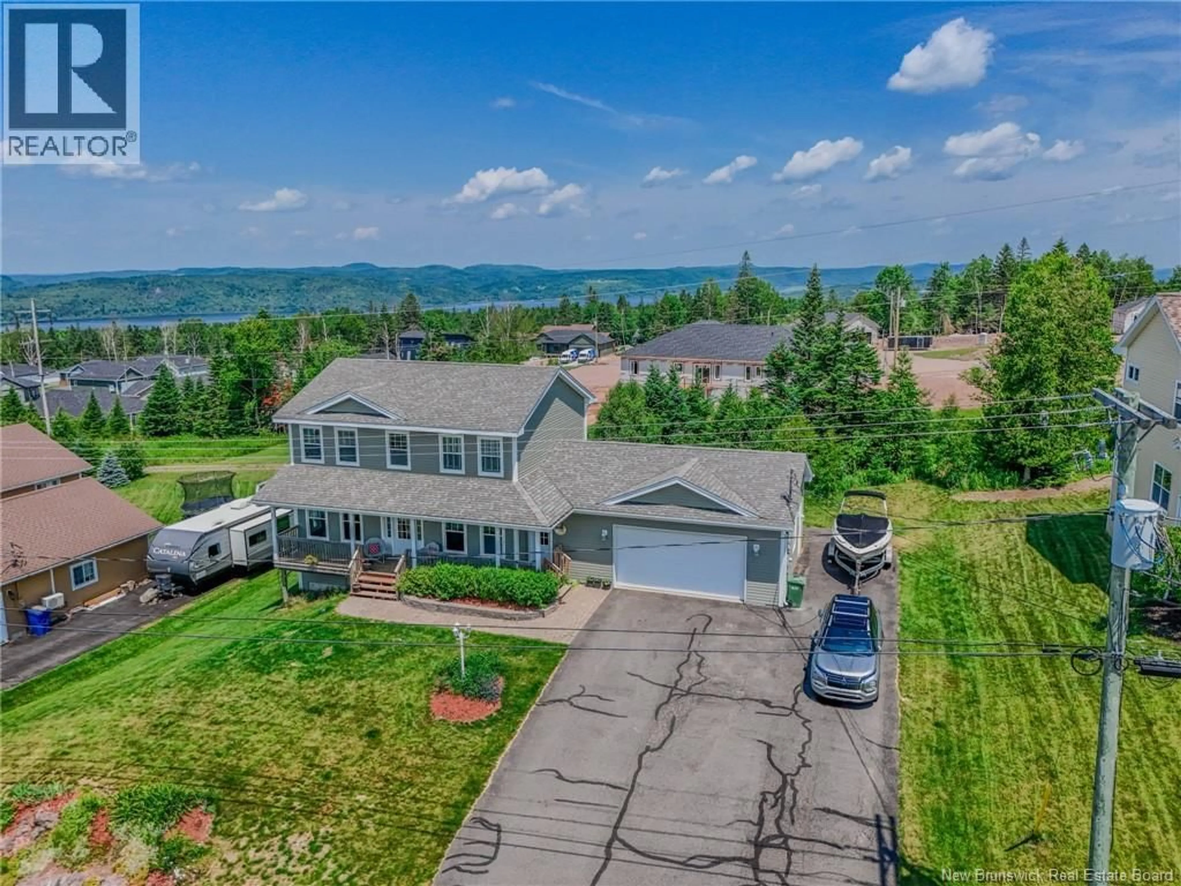 A pic from outside/outdoor area/front of a property/back of a property/a pic from drone, mountain view for 75 FLAGSTONE DRIVE, Quispamsis New Brunswick E2G0B9