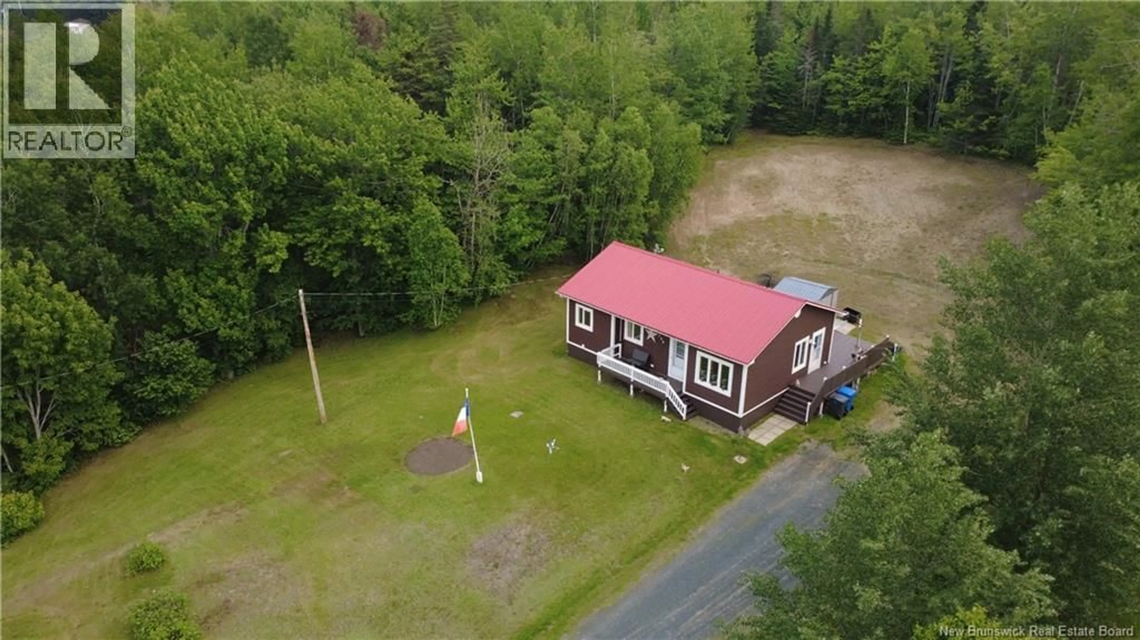 A pic from outside/outdoor area/front of a property/back of a property/a pic from drone, building for 208 RUE ADELARD, Pont-Lafrance New Brunswick E1X1P6