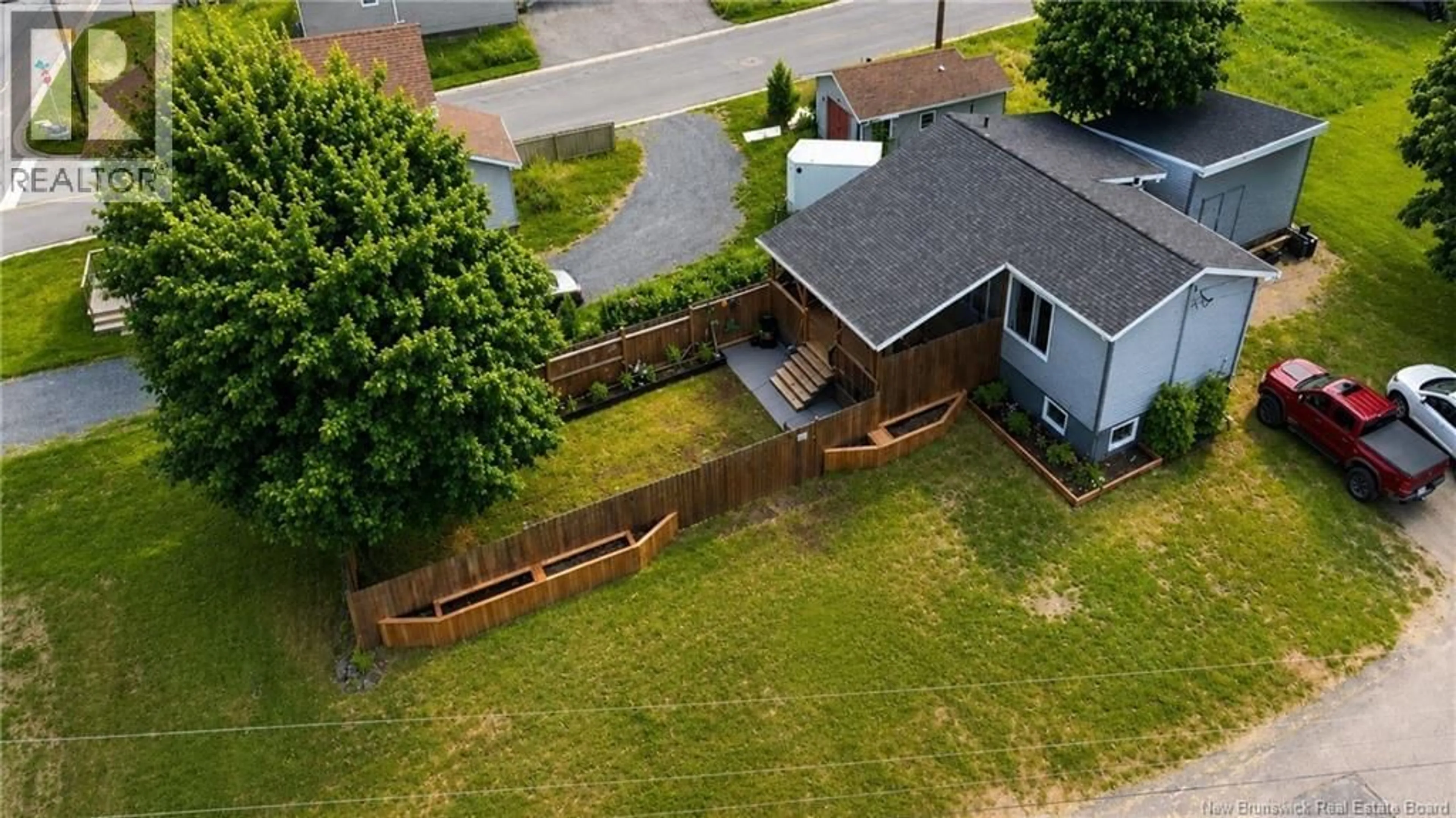 A pic from outside/outdoor area/front of a property/back of a property/a pic from drone, street for 1245 ST THERESA CRESCENT, Bathurst New Brunswick E2A1K2