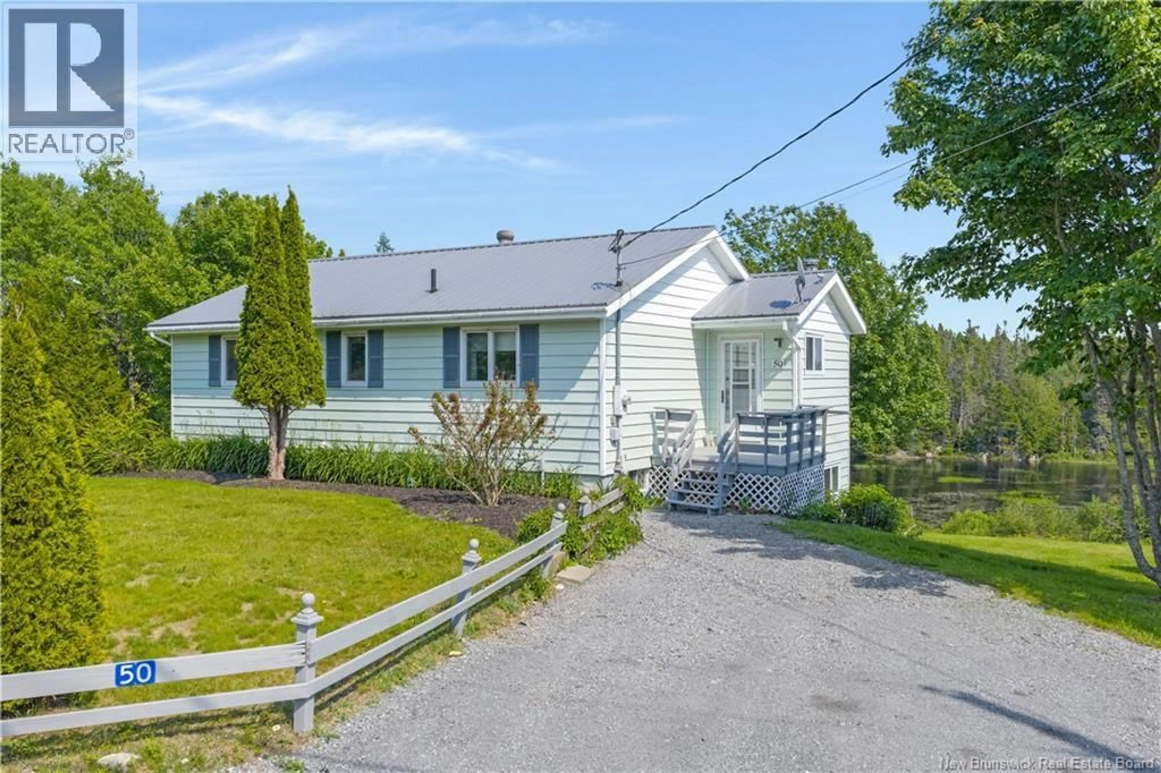 A pic from outside/outdoor area/front of a property/back of a property/a pic from drone, street for 50 SHERWOOD ROAD, Prince Of Wales New Brunswick E5J2K9