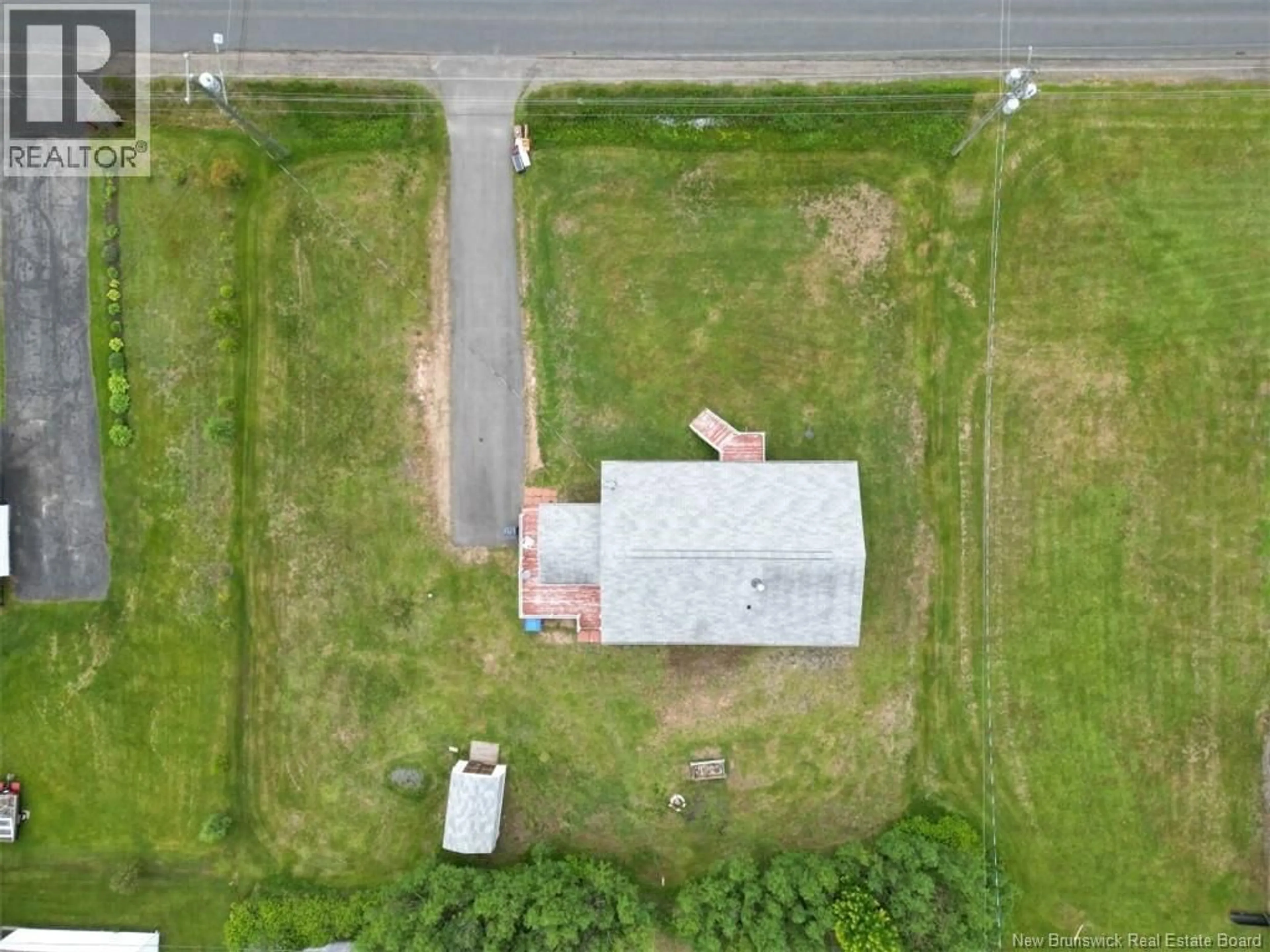 A pic from outside/outdoor area/front of a property/back of a property/a pic from drone, street for 3123 ROUTE 134, Miramichi Road New Brunswick E8L1V3