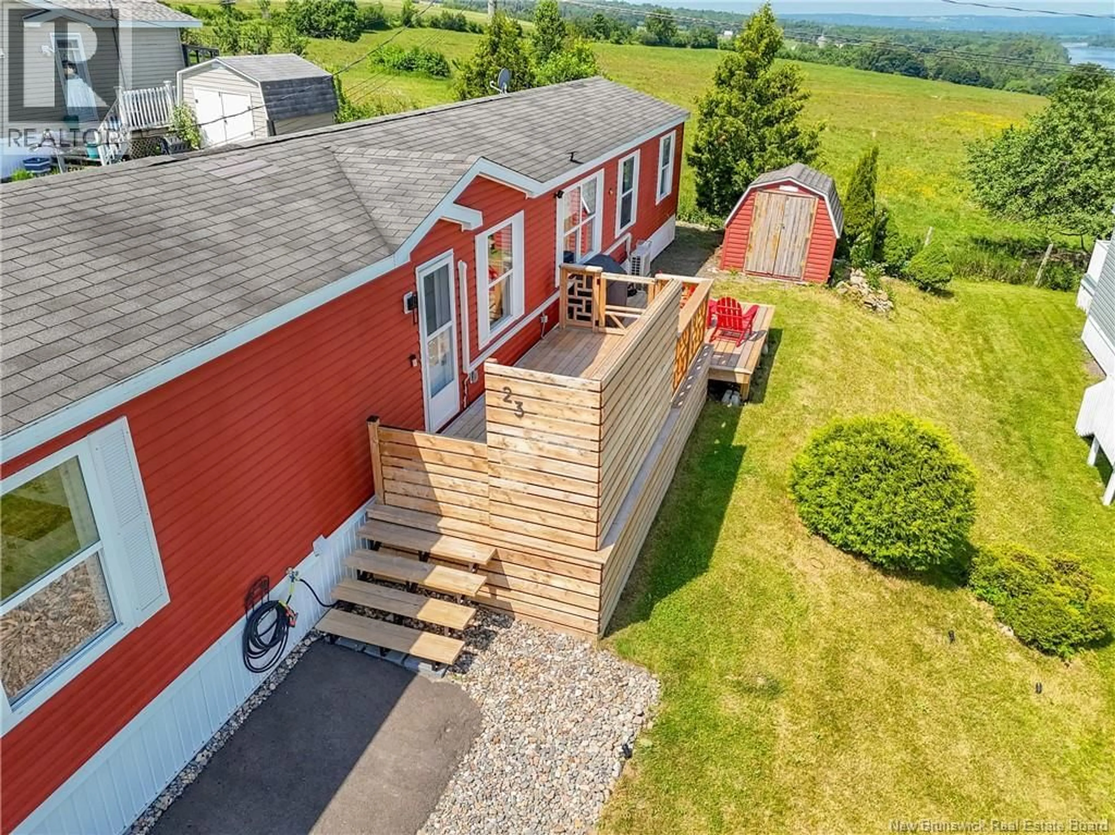 A pic from outside/outdoor area/front of a property/back of a property/a pic from drone, unknown for 23 BARRINGTON ROAD, Fredericton New Brunswick E3C0A5