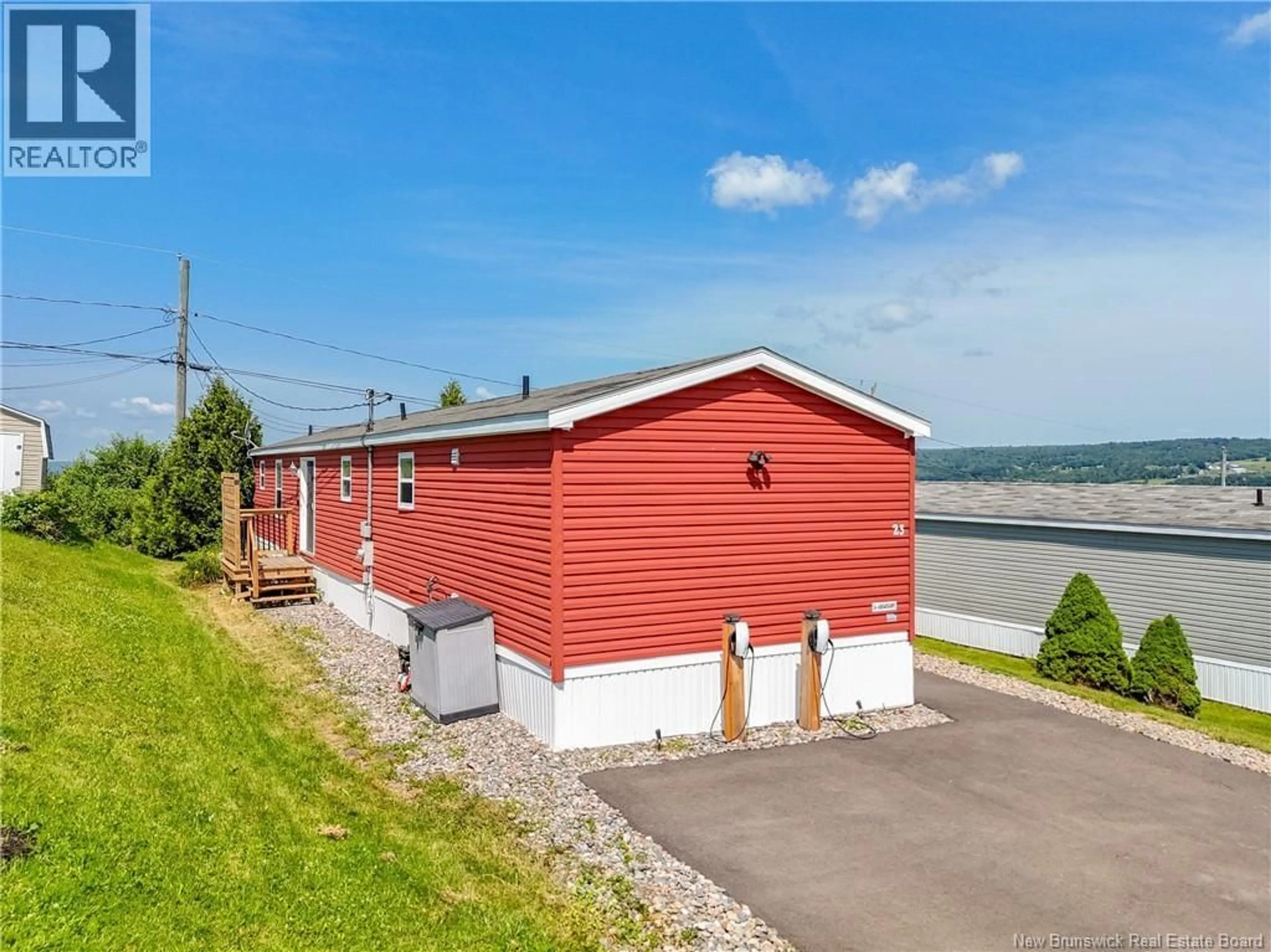 A pic from outside/outdoor area/front of a property/back of a property/a pic from drone, water/lake/river/ocean view for 23 BARRINGTON ROAD, Fredericton New Brunswick E3C0A5
