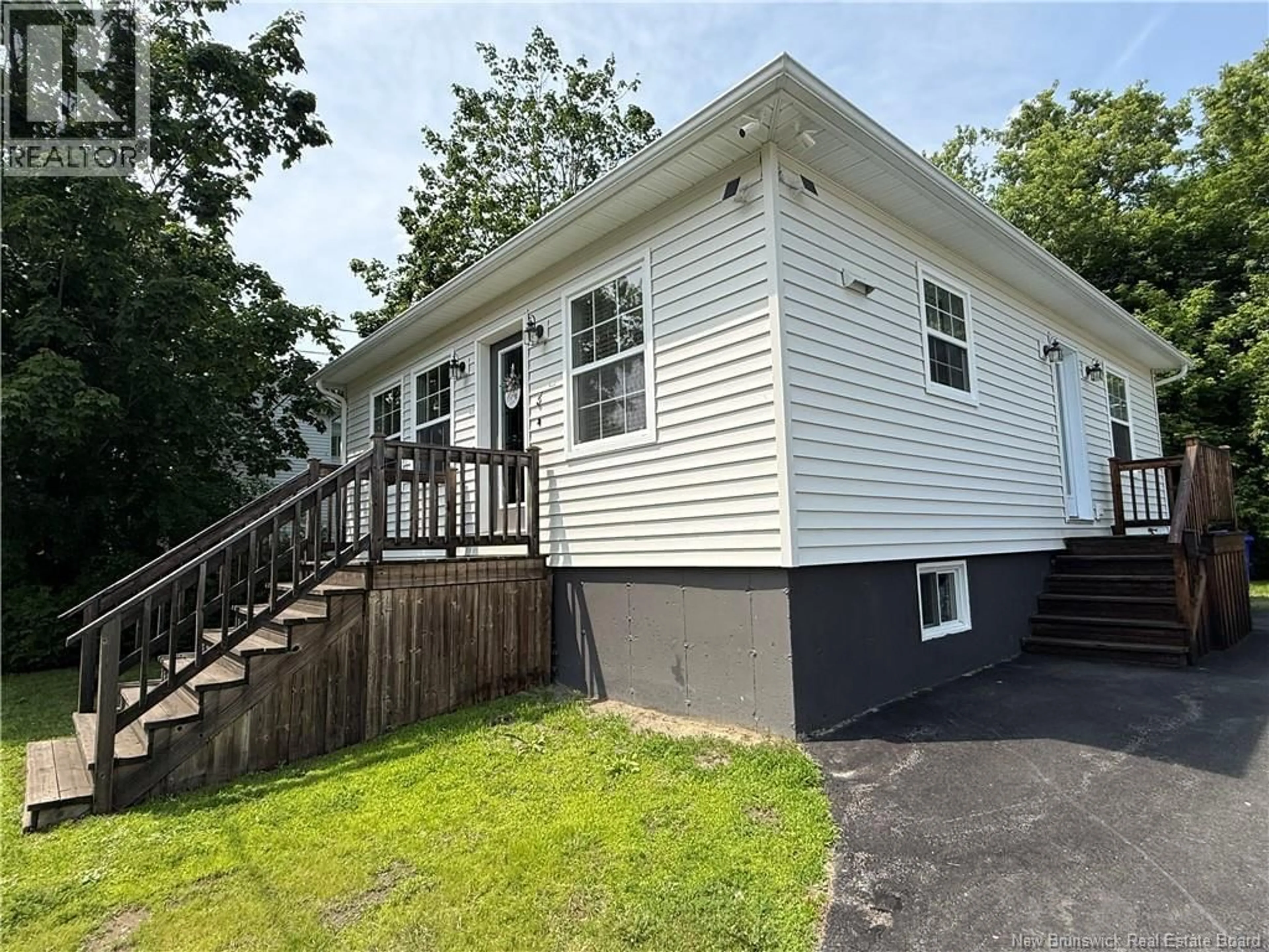 Home with vinyl exterior material, street for 3 VICTORIA STREET, St. Stephen New Brunswick E3L2R2