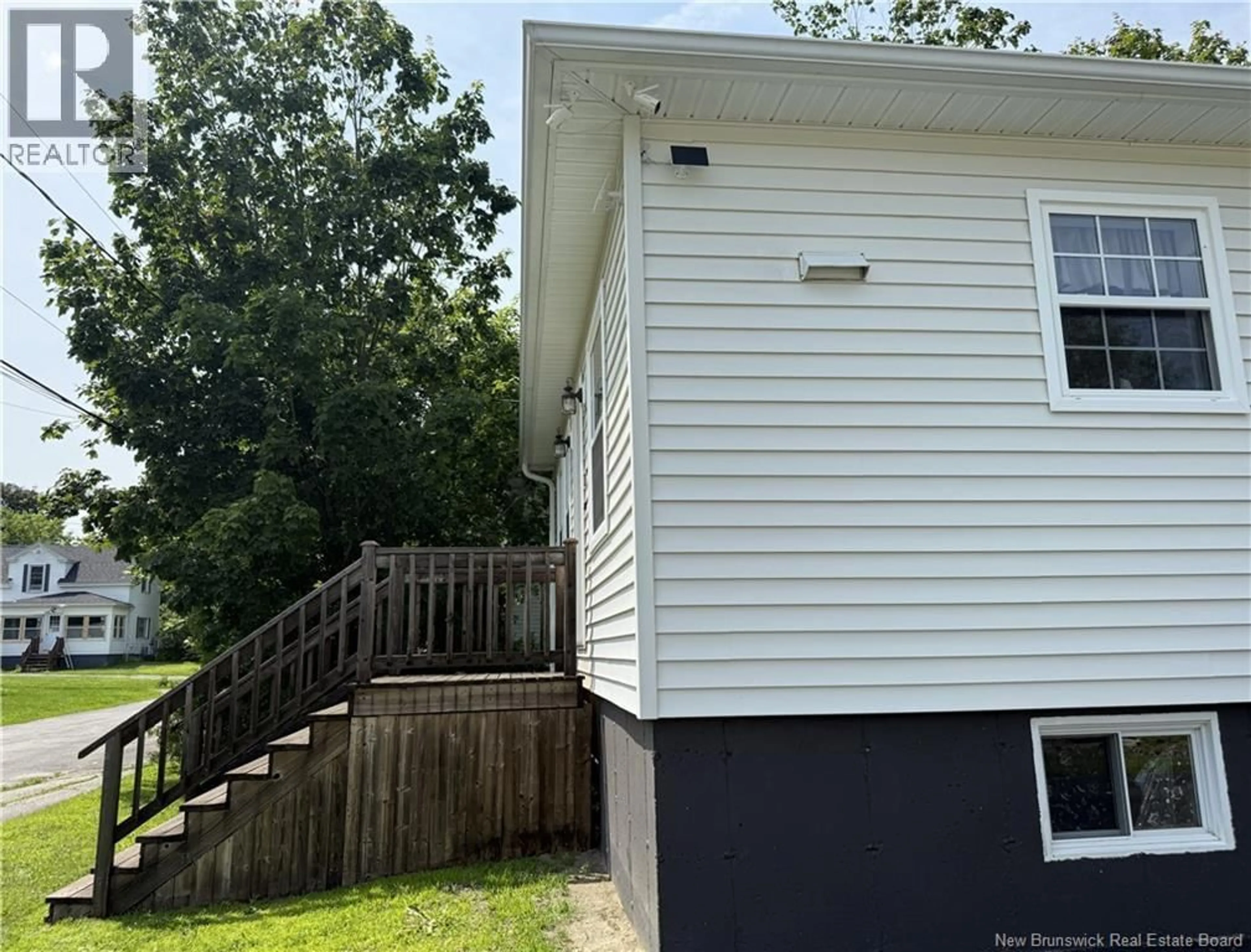 Home with vinyl exterior material, street for 3 VICTORIA STREET, St. Stephen New Brunswick E3L2R2